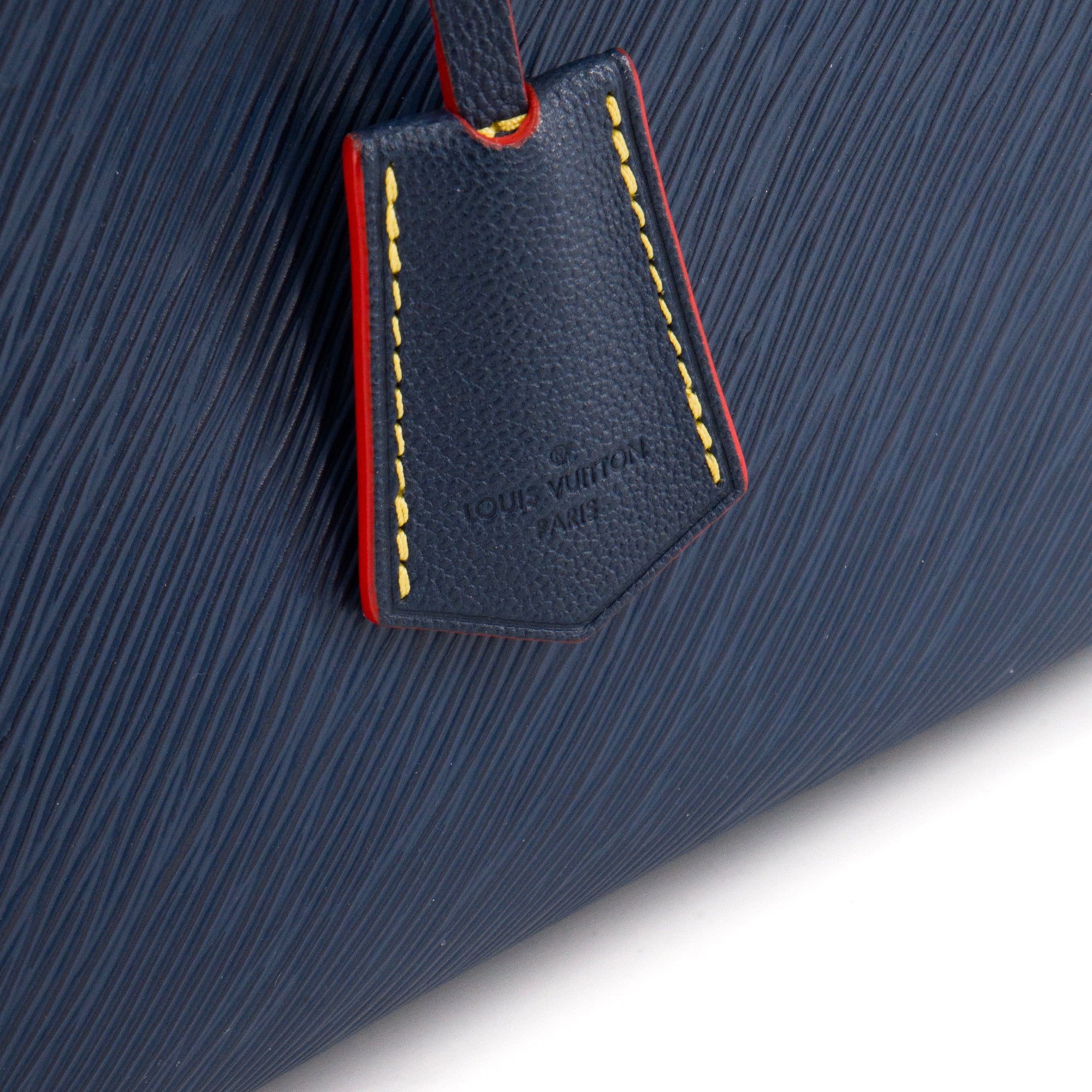 LOUIS VUITTON - Sac Cabas Twist Louis Vuitton en cuir épi bleu et rouge