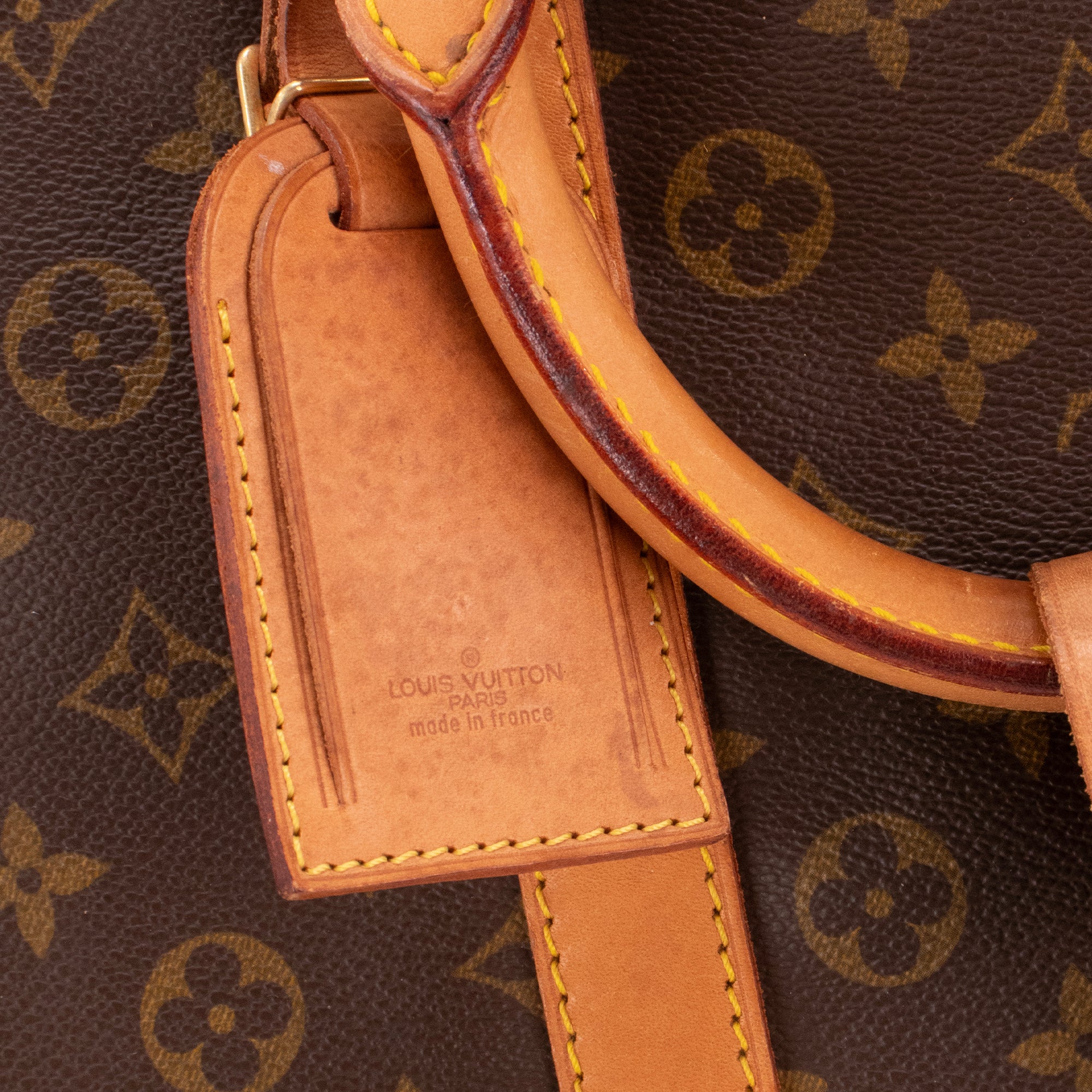 LOUIS VUITTON - Sac de voyage Keepall 55 bandoulière Louis Vuitton en toile enduite monogrammée vintage