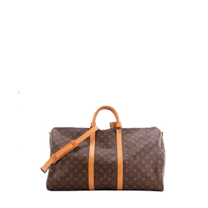 LOUIS VUITTON - Sac de voyage Keepall 55 bandoulière Louis Vuitton en toile enduite monogrammée vintage