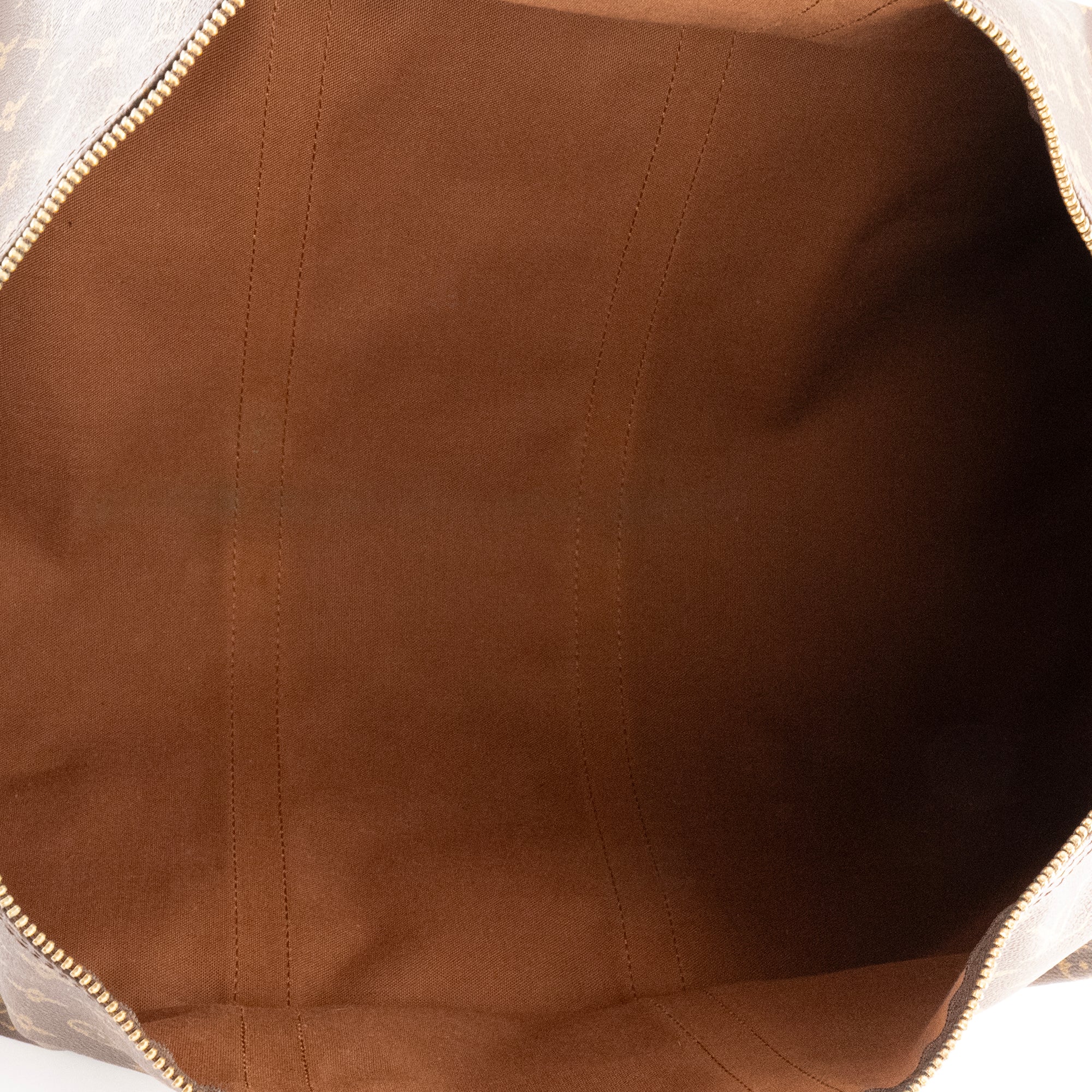 LOUIS VUITTON - Sac de voyage Keepall 55 Louis Vuitton en toile enduite monogrammée vintage