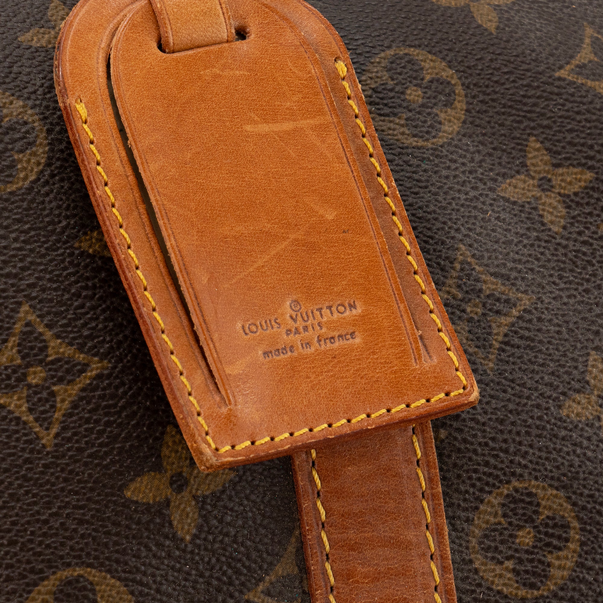 LOUIS VUITTON - Sac de voyage Keepall 55 Louis Vuitton en toile enduite monogrammée vintage