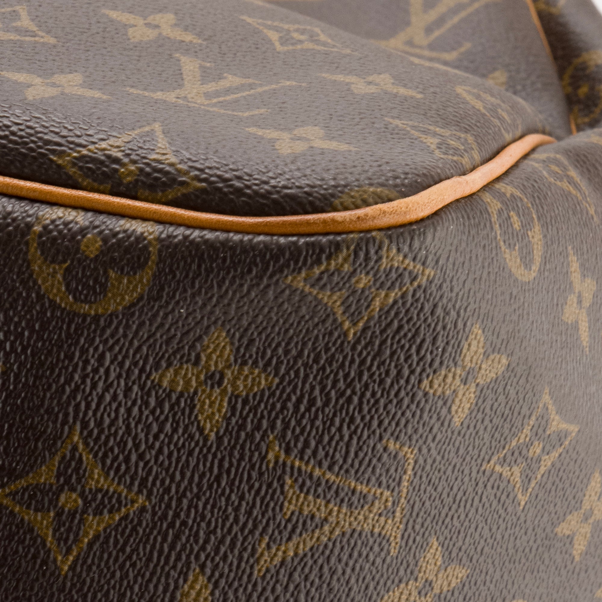 LOUIS VUITTON - Sac de voyage Keepall 55 Louis Vuitton en toile enduite monogrammée vintage