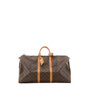 LOUIS VUITTON - Sac de voyage Keepall 55 Louis Vuitton en toile enduite monogrammée vintage