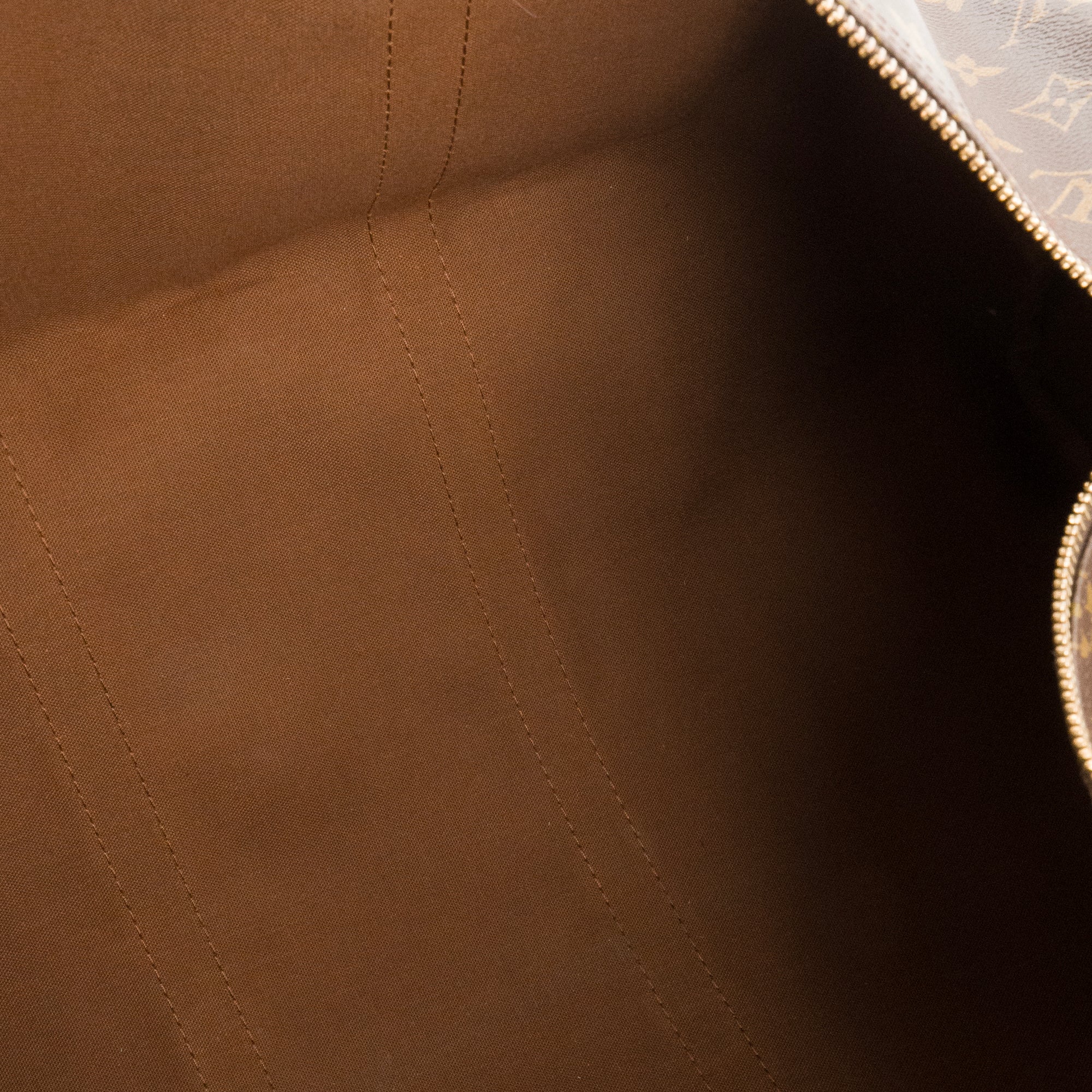 LOUIS VUITTON - Sac de voyage Keepall 55 Louis Vuitton en toile enduite monogrammée vintage