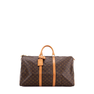 LOUIS VUITTON - Sac de voyage Keepall 55 Louis Vuitton en toile enduite monogrammée vintage