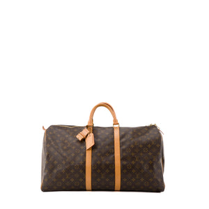 LOUIS VUITTON - Sac de voyage Keepall 55 Louis Vuitton en toile enduite monogrammée vintage