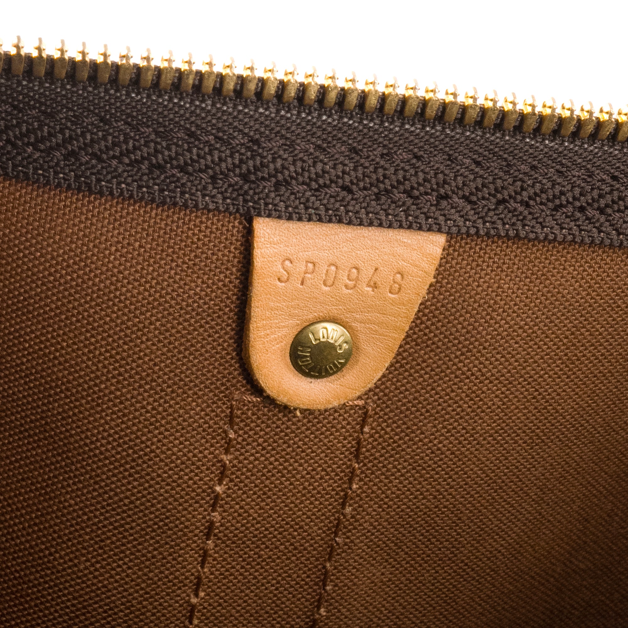 LOUIS VUITTON - Sac de voyage Keepall 55 Louis Vuitton en toile enduite monogrammée vintage