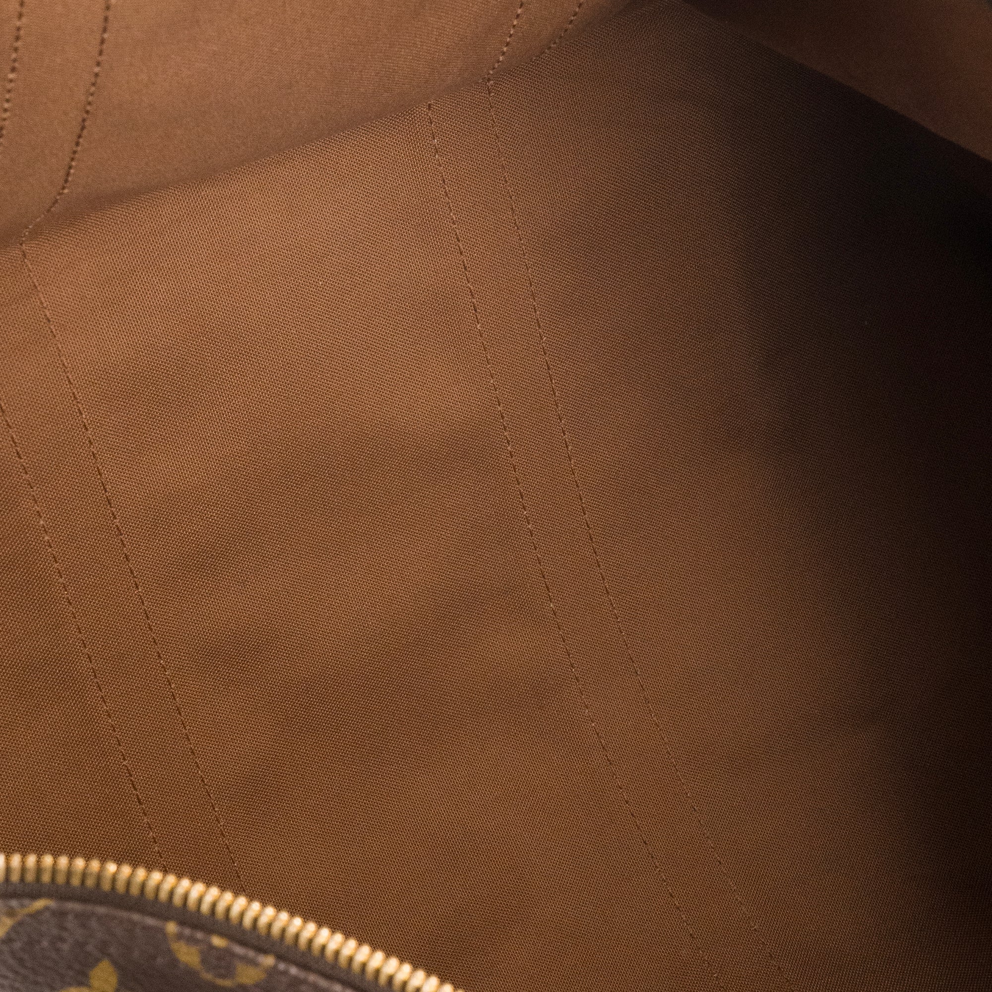 LOUIS VUITTON - Sac de voyage Keepall 55 Louis Vuitton en toile enduite monogrammée vintage