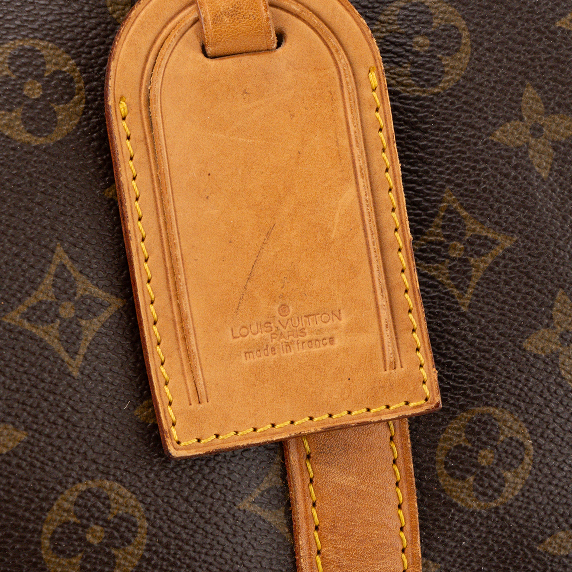 LOUIS VUITTON - Sac de voyage Keepall 55 Louis Vuitton en toile monogrammée marron vintage