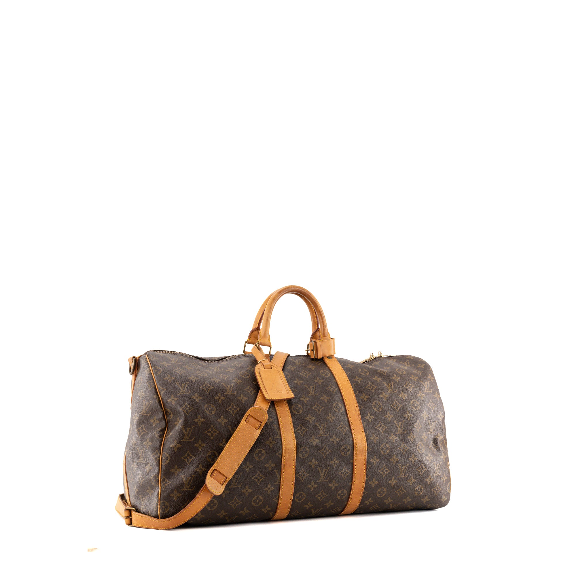 LOUIS VUITTON - Sac de voyage Keepall 55 Louis Vuitton en toile monogrammée marron vintage