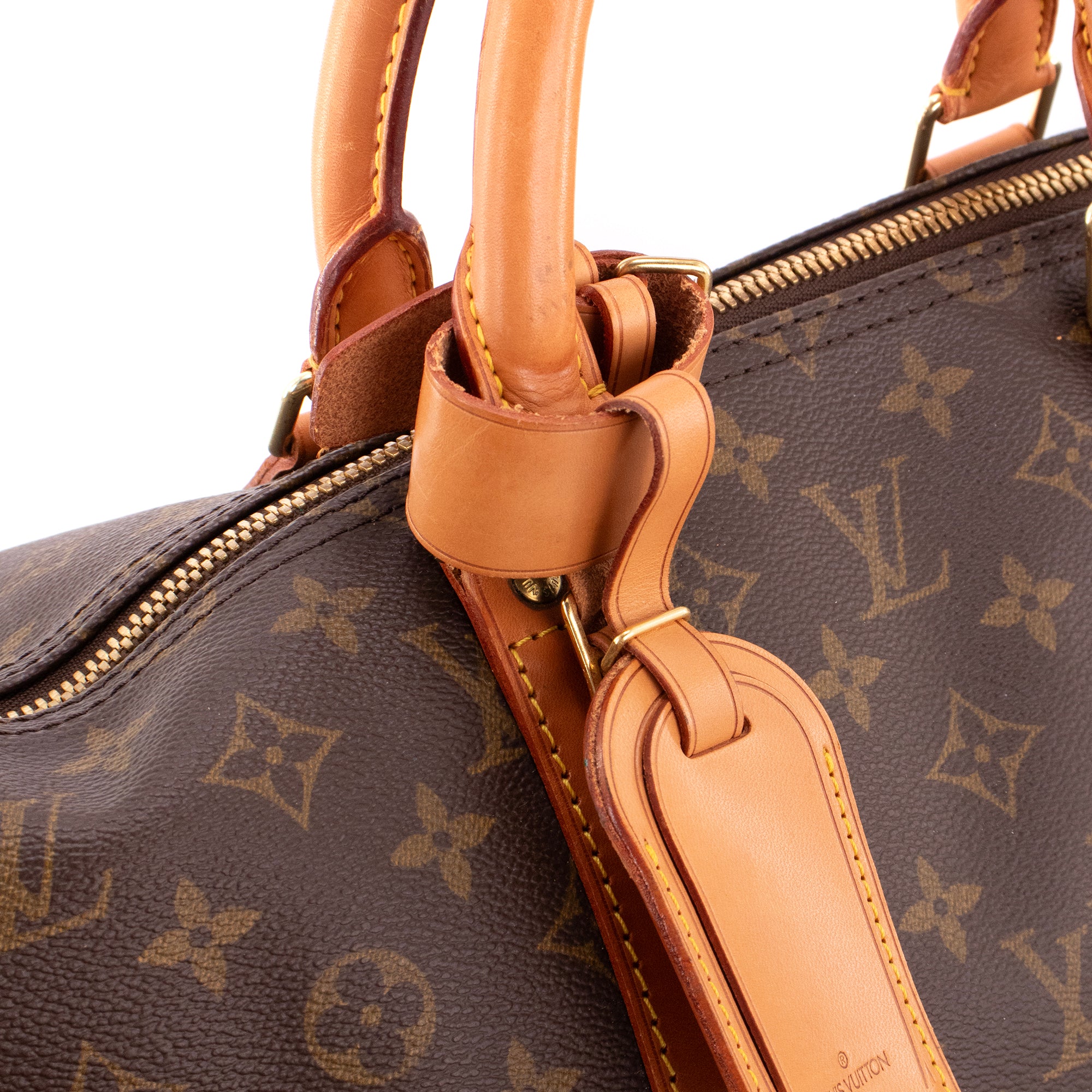 LOUIS VUITTON - Sac de voyage Keepall 55 Louis Vuitton en toile monogrammée vintage
