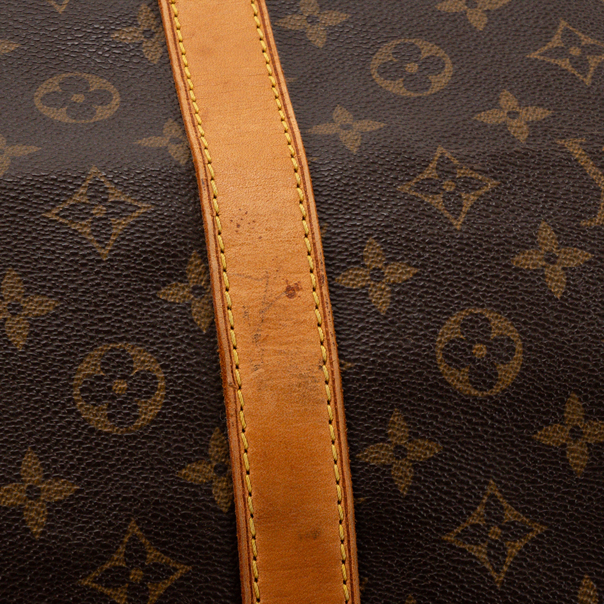 LOUIS VUITTON - Sac de voyage Keepall Louis Vuitton en toile enduite monogrammée vintage