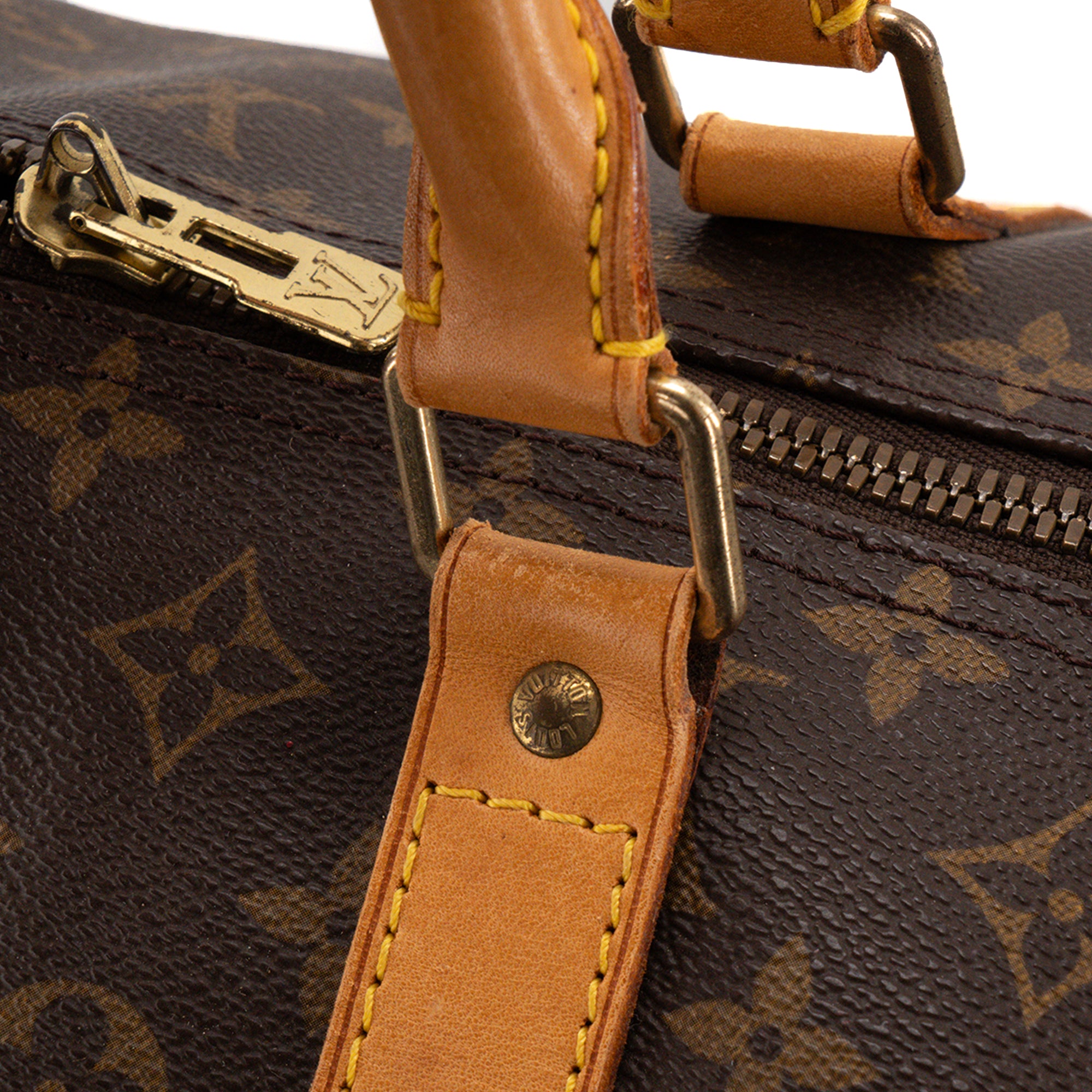 LOUIS VUITTON - Sac de voyage Keepall Louis Vuitton en toile enduite monogrammée vintage
