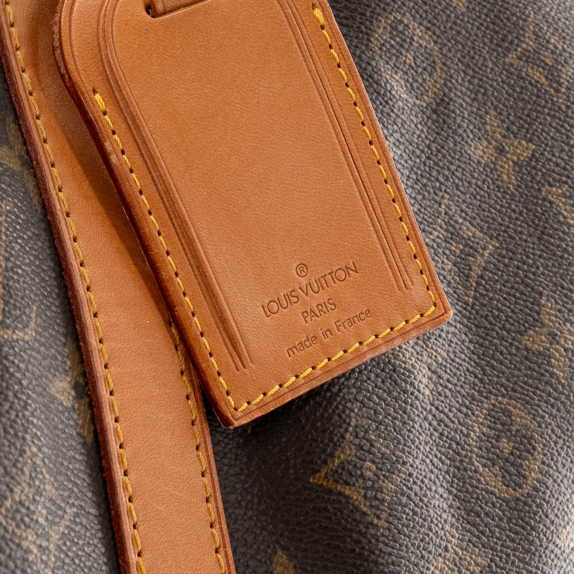 LOUIS VUITTON - Sac de voyage Sirius 65 Louis Vuitton en toile enduite monogrammée vintage