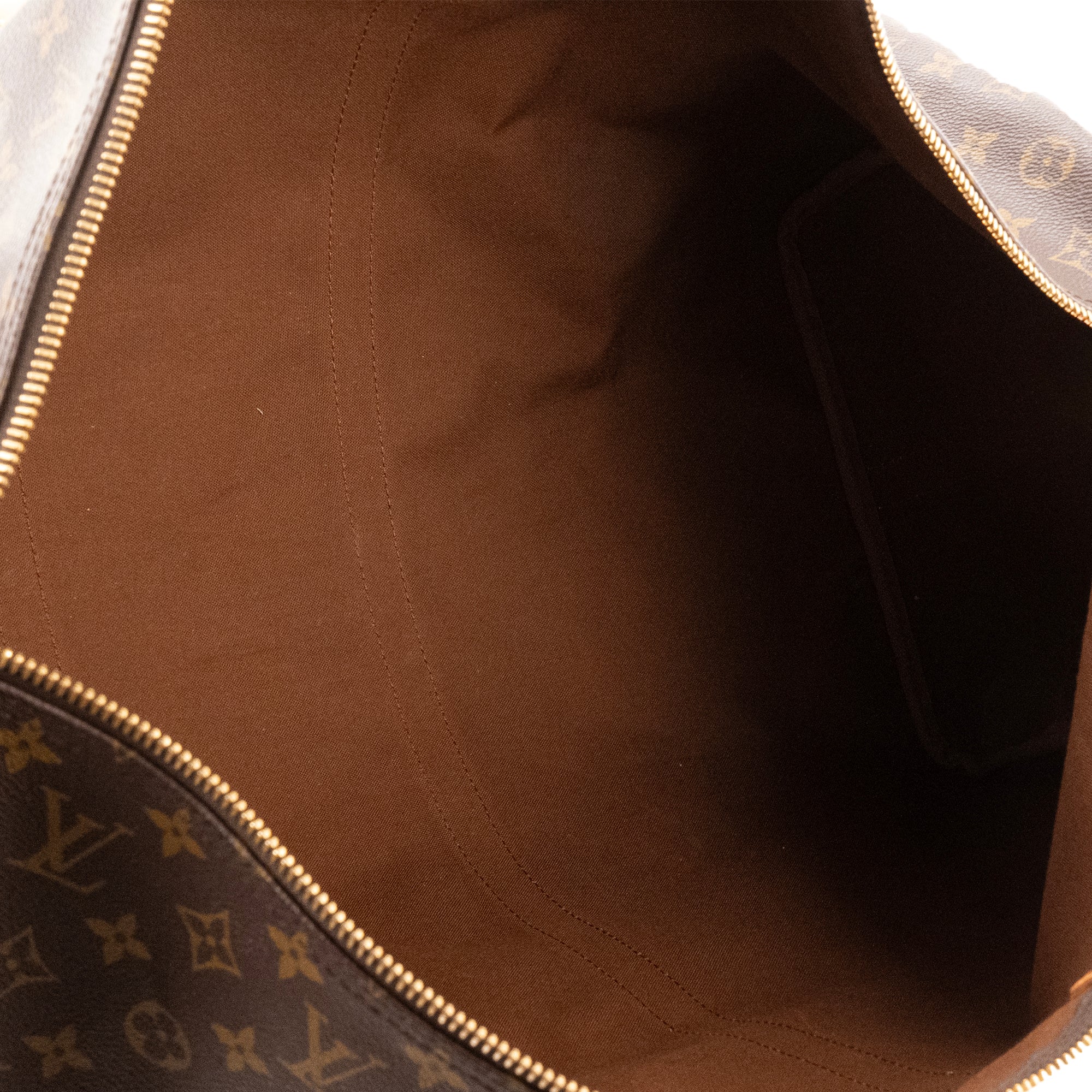 LOUIS VUITTON - Sac de voyage Keepall 60 Louis Vuitton en toile enduite monogrammée vintage