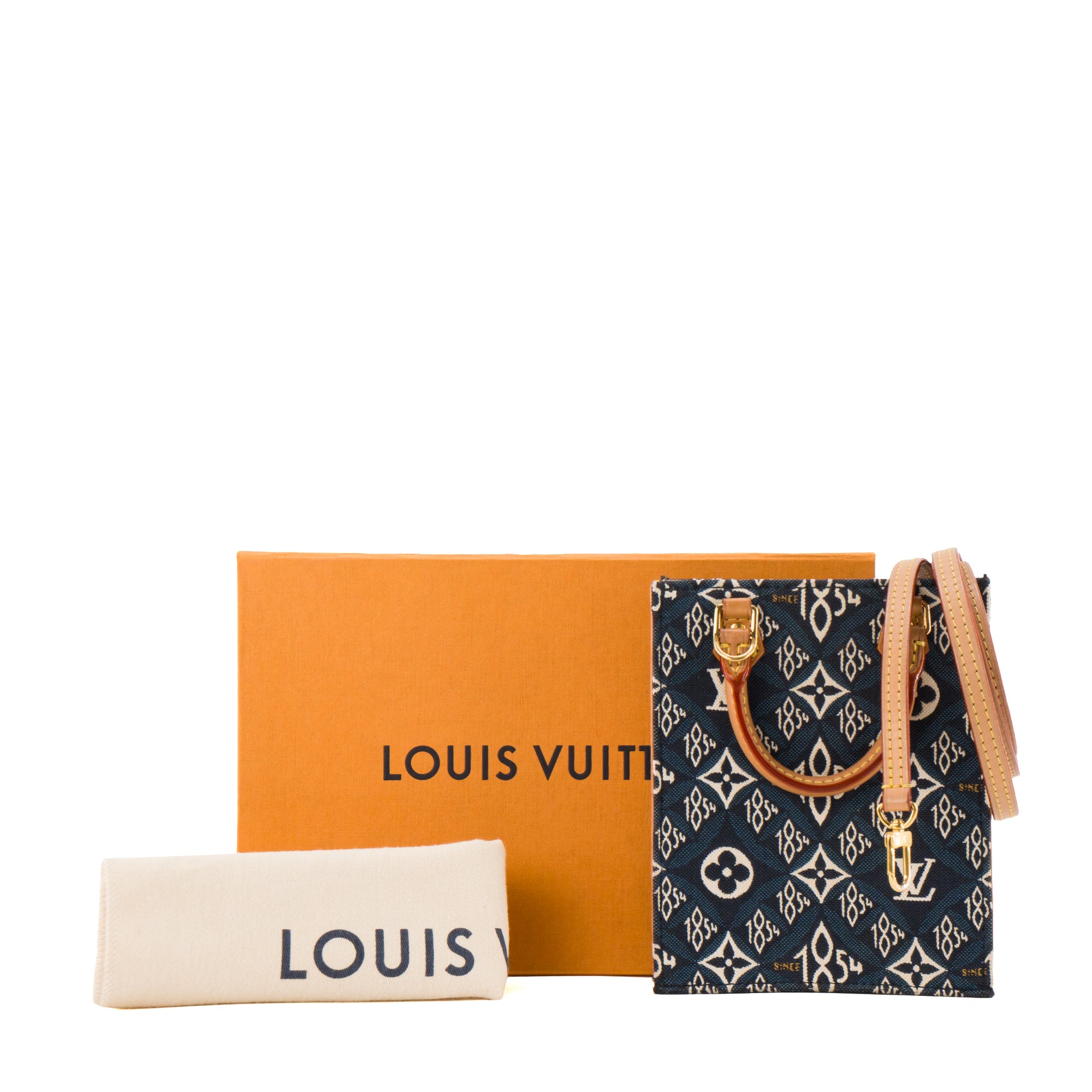 LOUIS VUITTON - Sac à bandoulière Plat mini Louis Vuitton en denim et cuir naturel édition limitée Since 1854