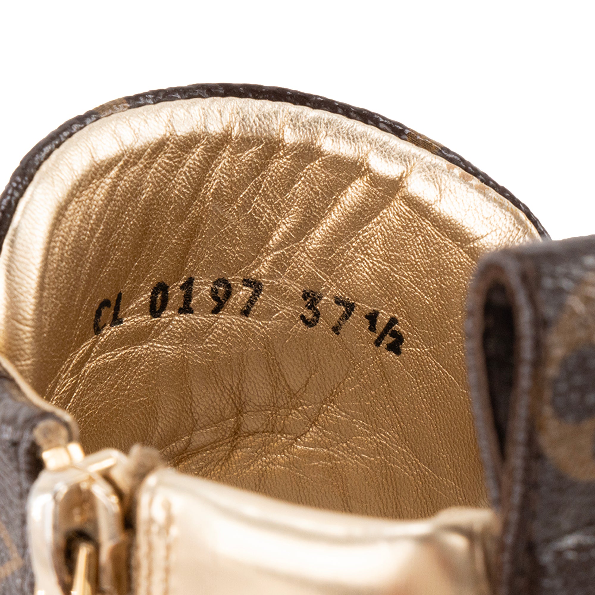 LOUIS VUITTON - Sneakers Stellar Louis Vuitton en toile enduite monogrammée et cuir métallisé doré (37,5)