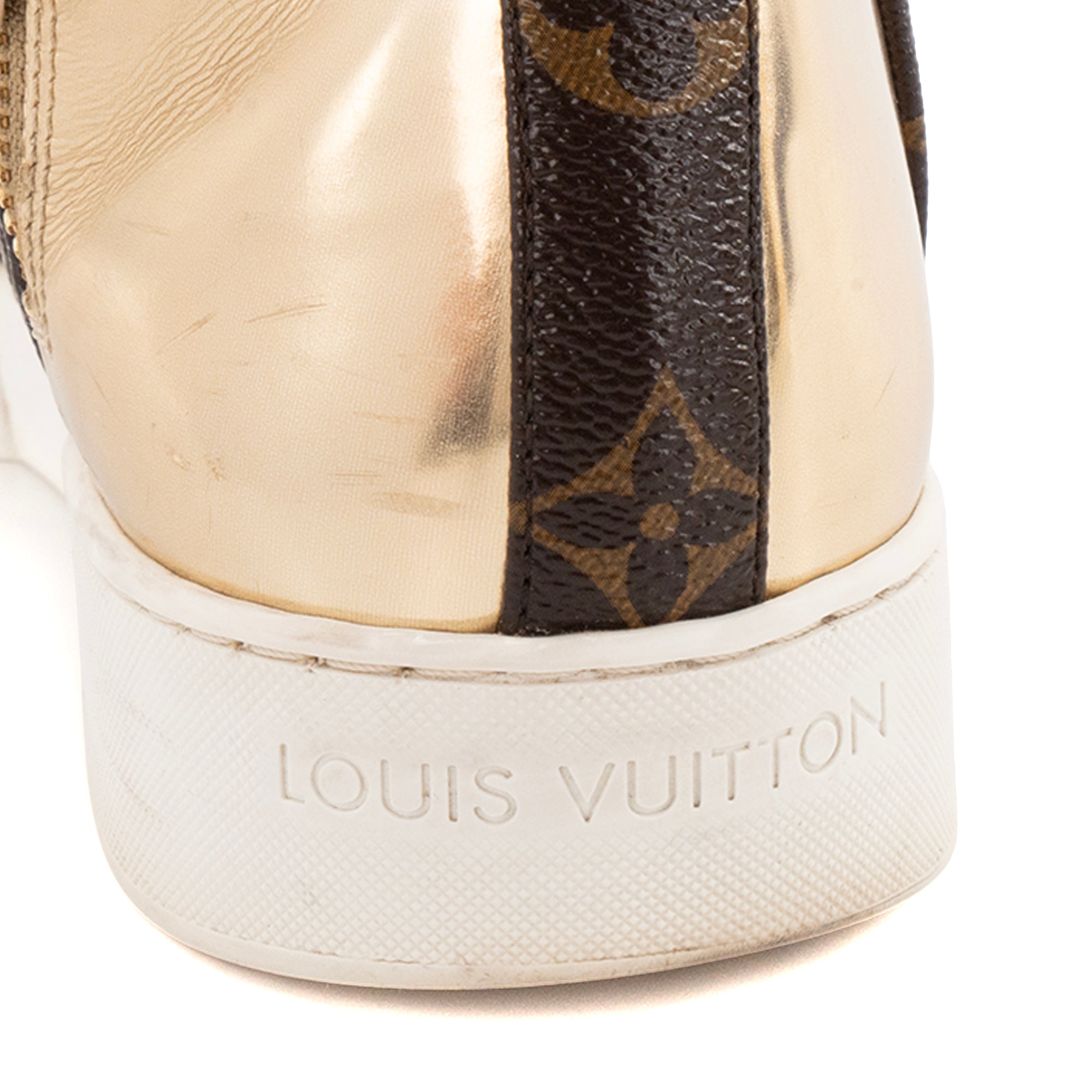 LOUIS VUITTON - Sneakers Stellar Louis Vuitton en toile enduite monogrammée et cuir métallisé doré (37,5)