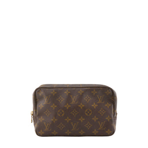 LOUIS VUITTON - Trousse de toilette PM Louis Vuitton en toile enduite monogrammée vintage