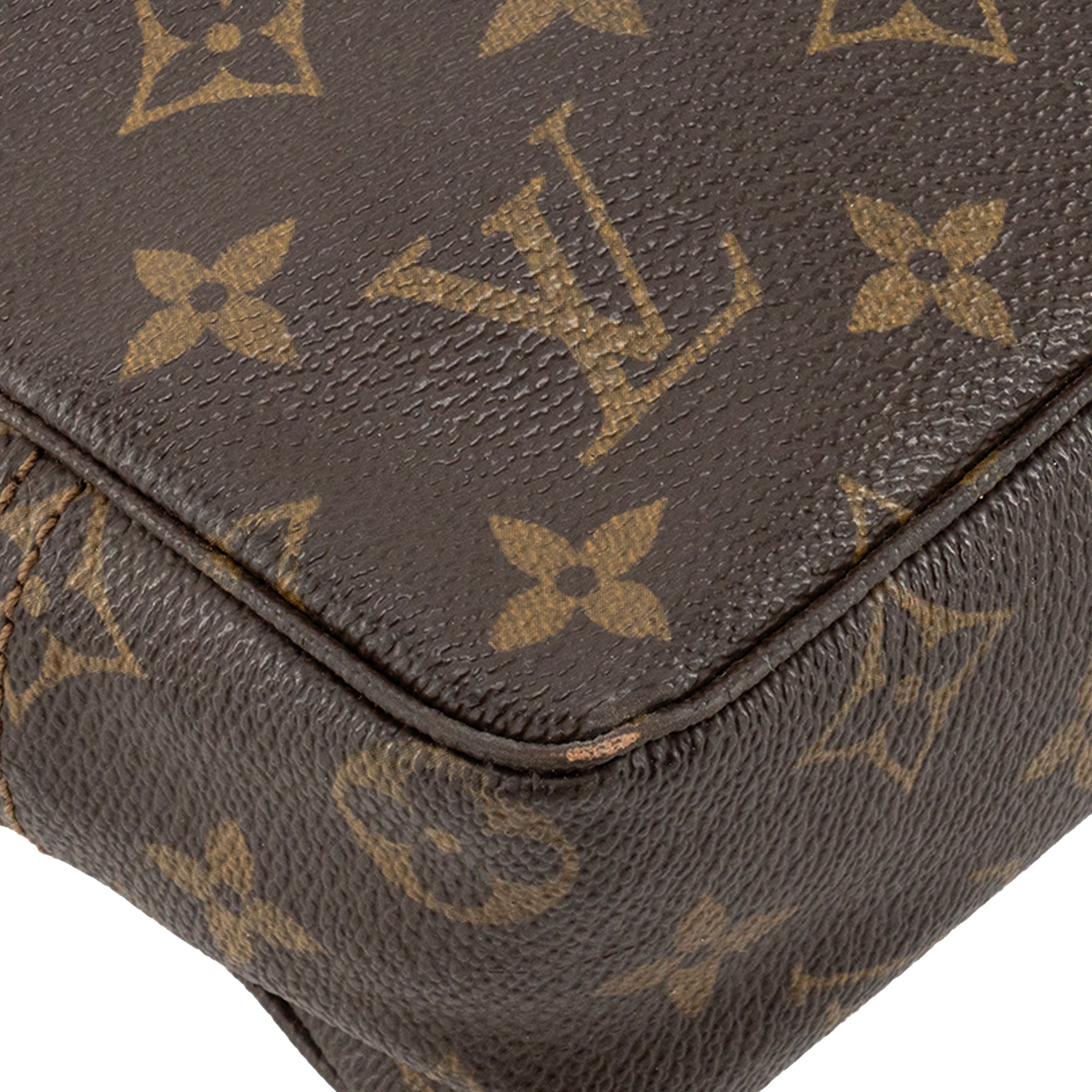 LOUIS VUITTON - Trousse de toilette PM Louis Vuitton en toile enduite monogrammée vintage