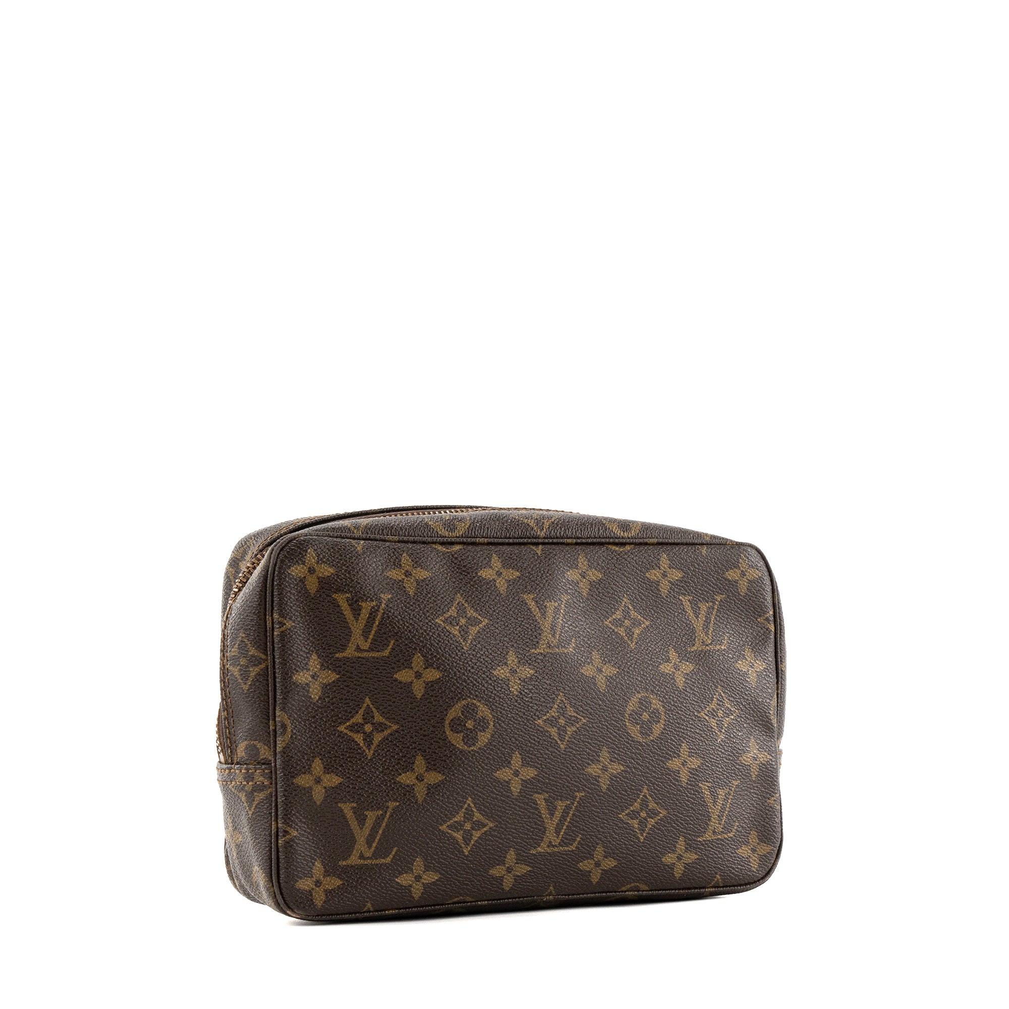 LOUIS VUITTON - Trousse de toilette PM Louis Vuitton en toile enduite monogrammée vintage