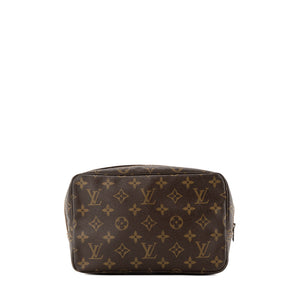LOUIS VUITTON - Trousse de toilette PM Louis Vuitton en toile enduite monogrammée vintage