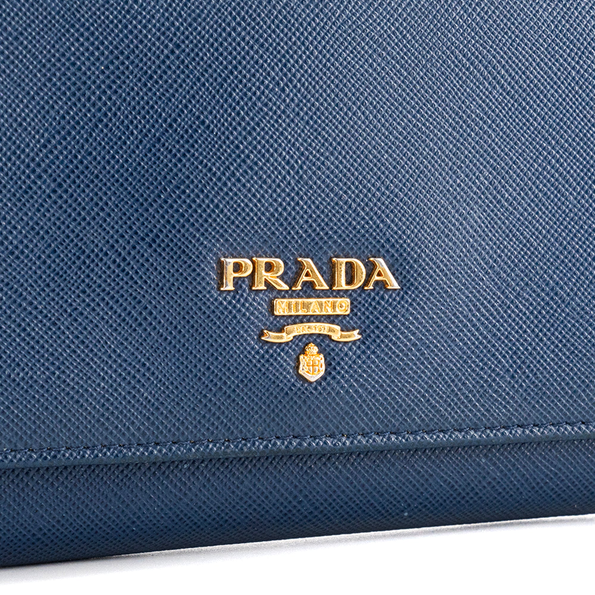 PRADA - Portefeuille Prada en cuir grainé bleu