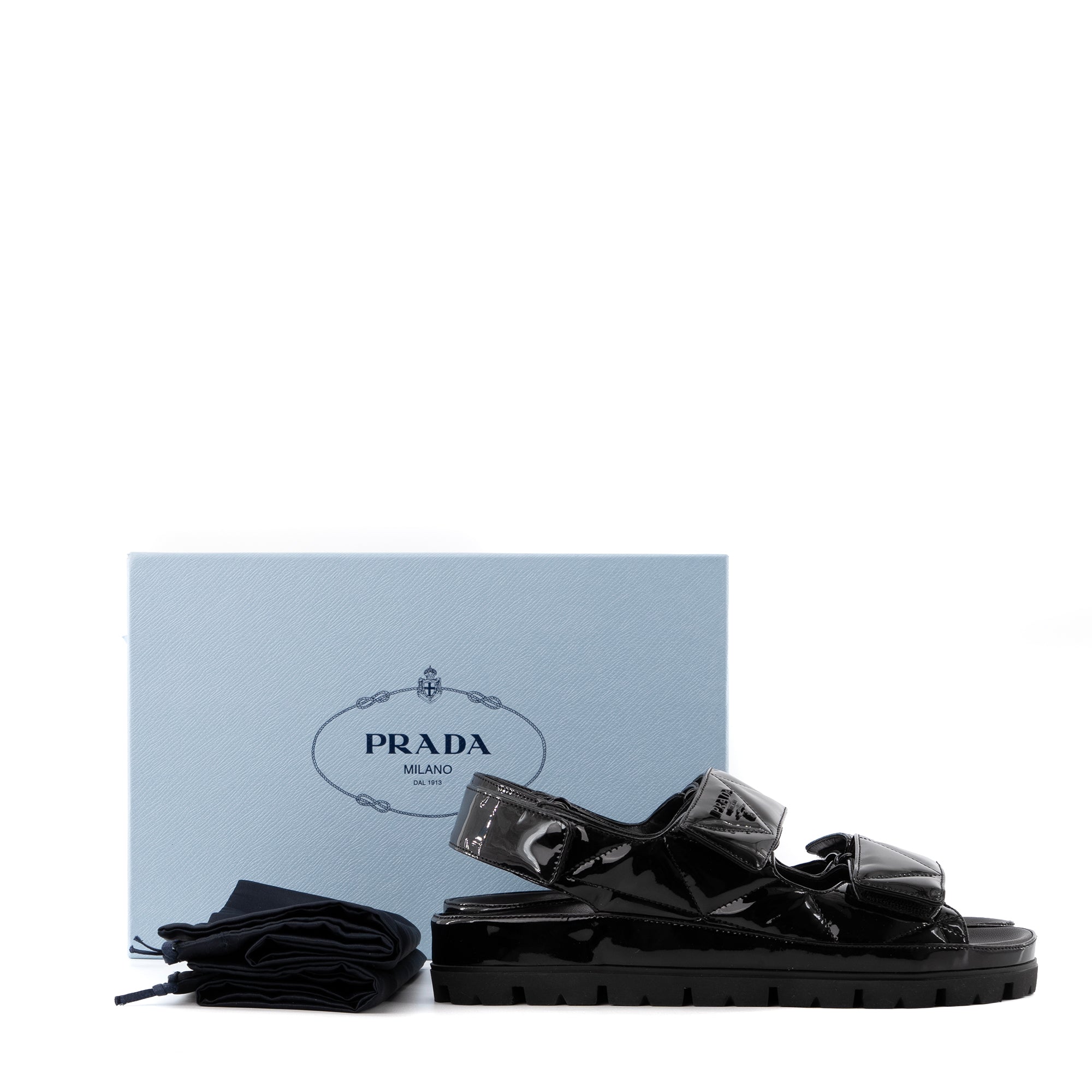 PRADA - Sandales Prada en cuir verni noir (T38.5)