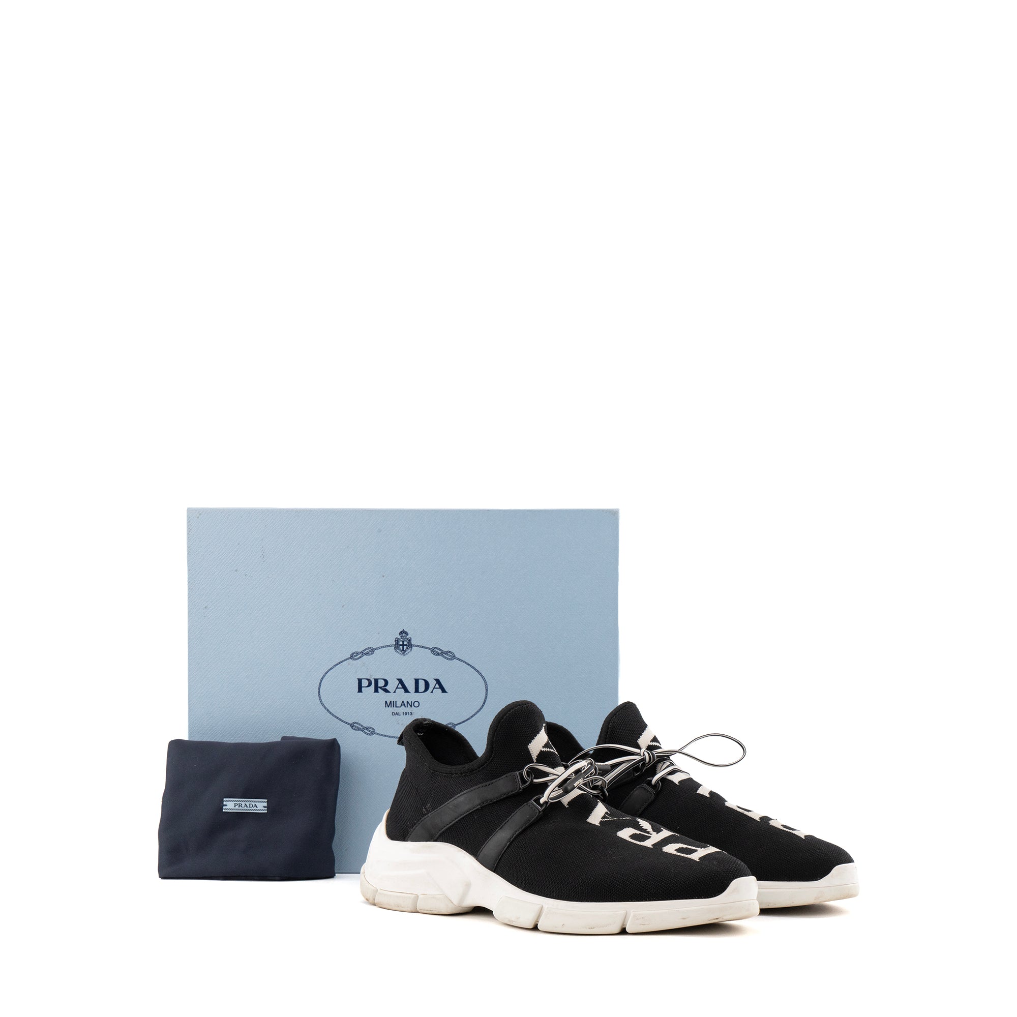 PRADA - Sneakers Calzature Prada en toile noire et blanche (T38)