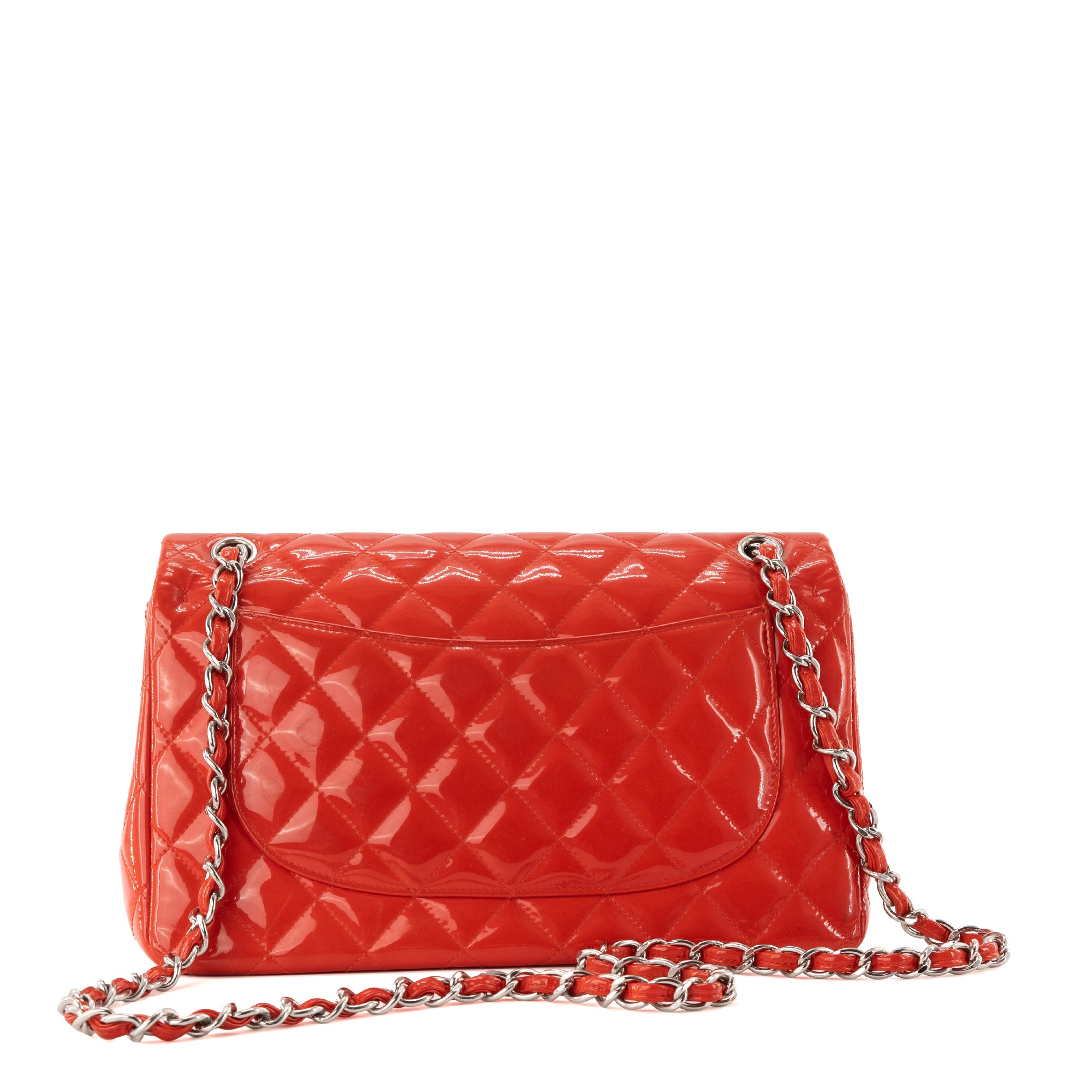 CHANEL - Sac à bandoulière Classique/Timeless Jumbo Chanel en cuir verni rouge