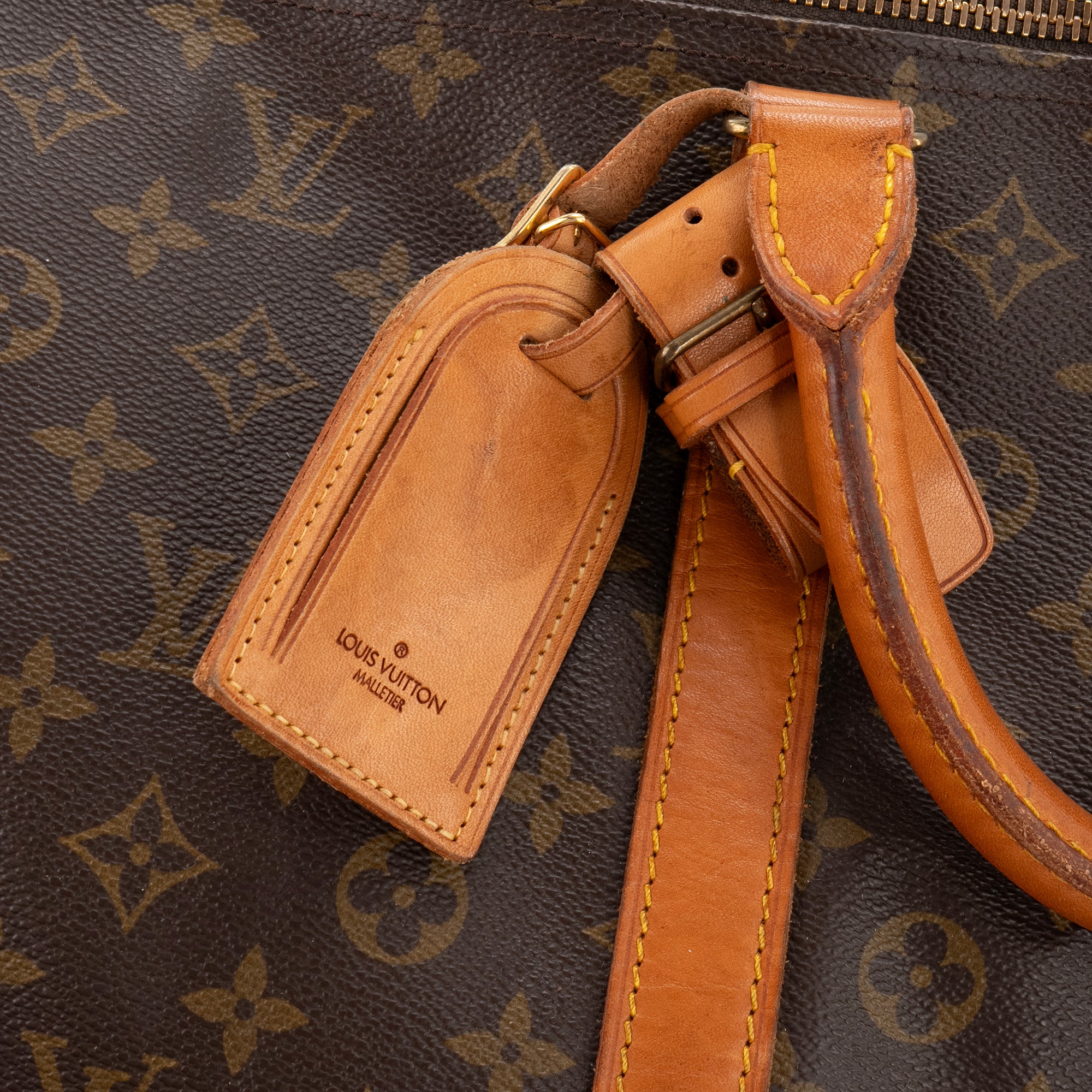 LOUIS VUITTON - Sac de voyage Keepall 60 bandoulière Louis Vuitton en toile enduite monogrammée vintage