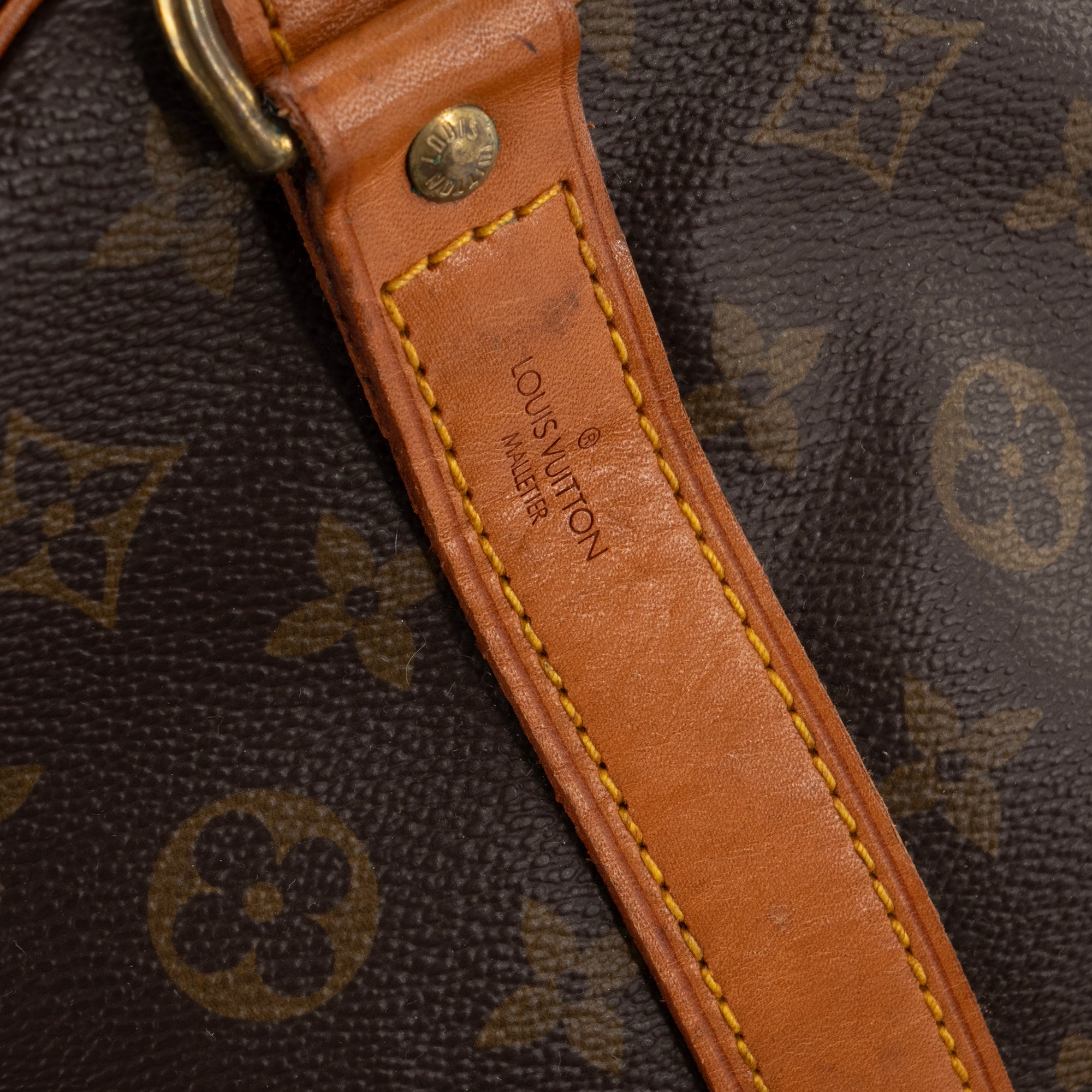 LOUIS VUITTON - Sac de voyage Keepall 60 bandoulière Louis Vuitton en toile enduite monogrammée vintage