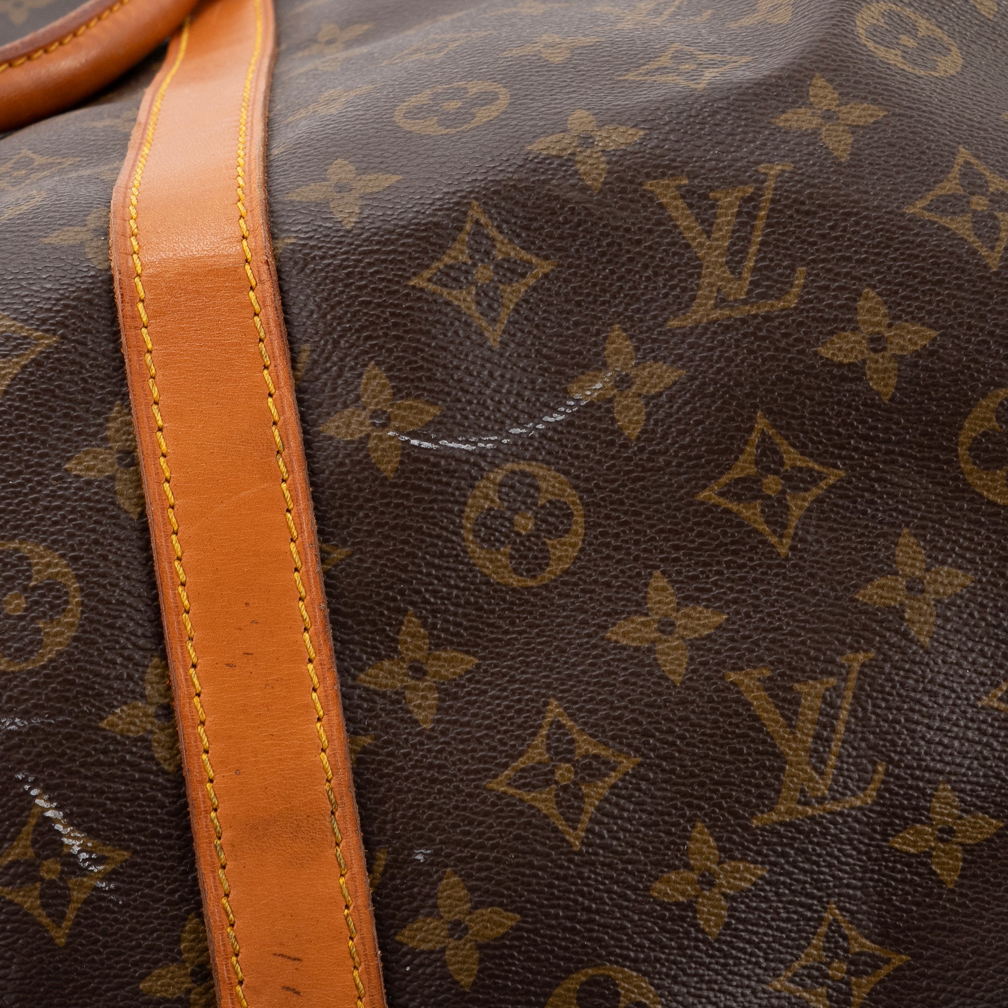 LOUIS VUITTON - Sac de voyage Keepall 60 bandoulière Louis Vuitton en toile enduite monogrammée vintage
