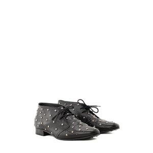 SAINT LAURENT - Derbies Saint Laurent en cuir lisse noir et studs argentés (T38)