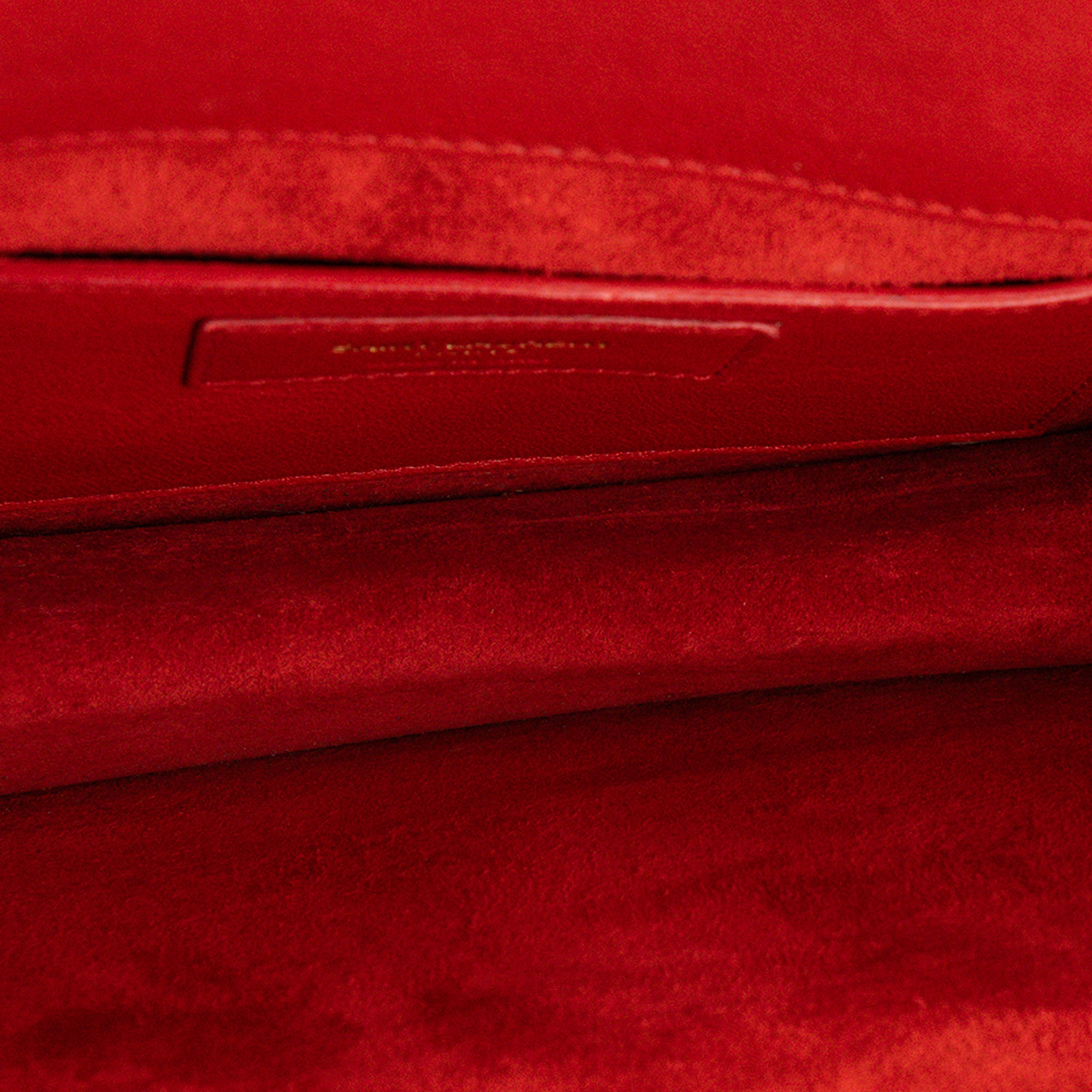 SAINT LAURENT - Pochette Betty Saint Laurent en cuir grainé rouge et clous dorés