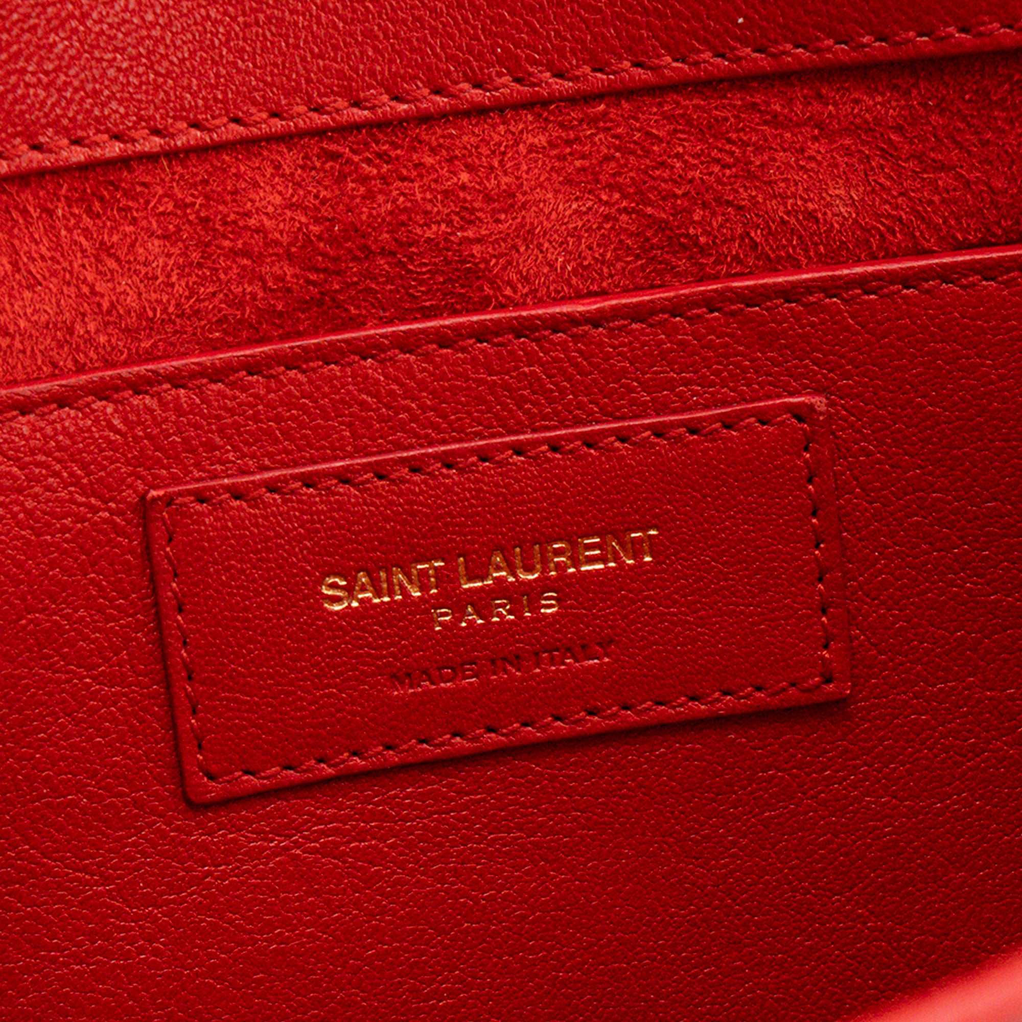 SAINT LAURENT - Pochette Betty Saint Laurent en cuir grainé rouge et clous dorés