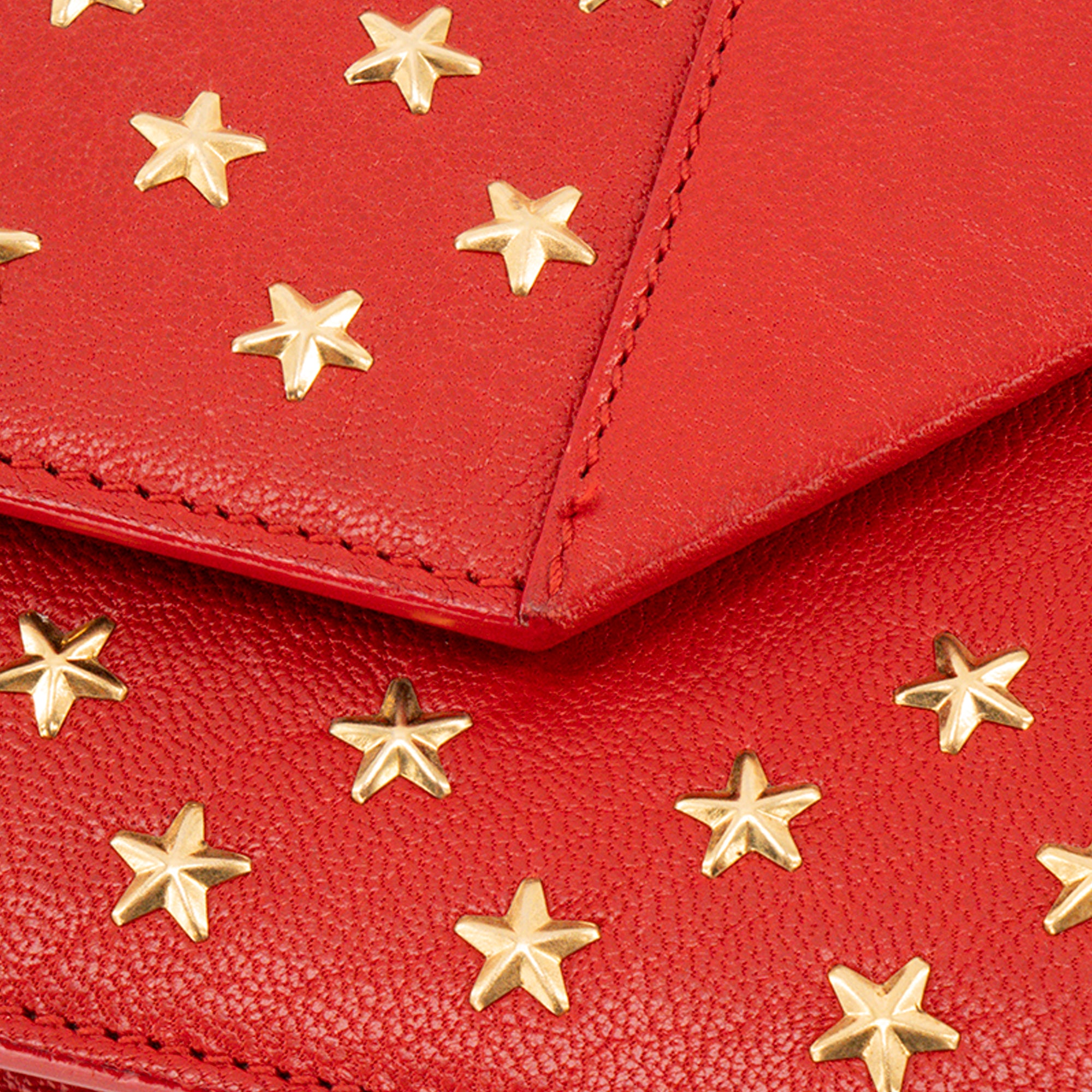 SAINT LAURENT - Pochette Betty Saint Laurent en cuir grainé rouge et clous dorés