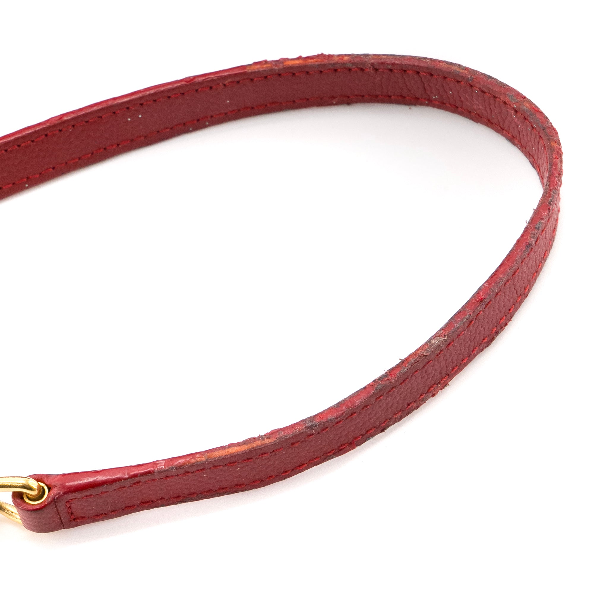 SAINT LAURENT - Sac à bandoulière Cassandre Saint Laurent en cuir grainé rouge