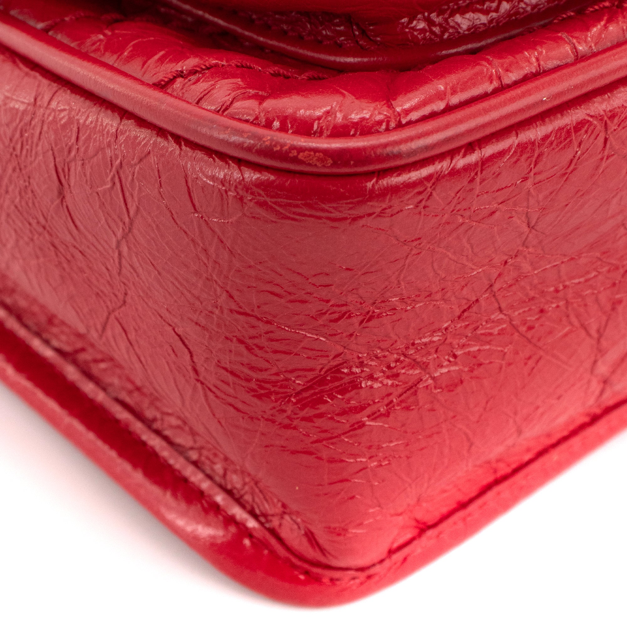 SAINT LAURENT - Sac à bandoulière Niki baby Saint Laurent en cuir froissé rouge