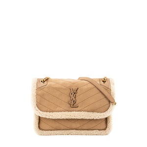 SAINT LAURENT - Sac à bandoulière Niki Saint Laurent en shearling et daim marron