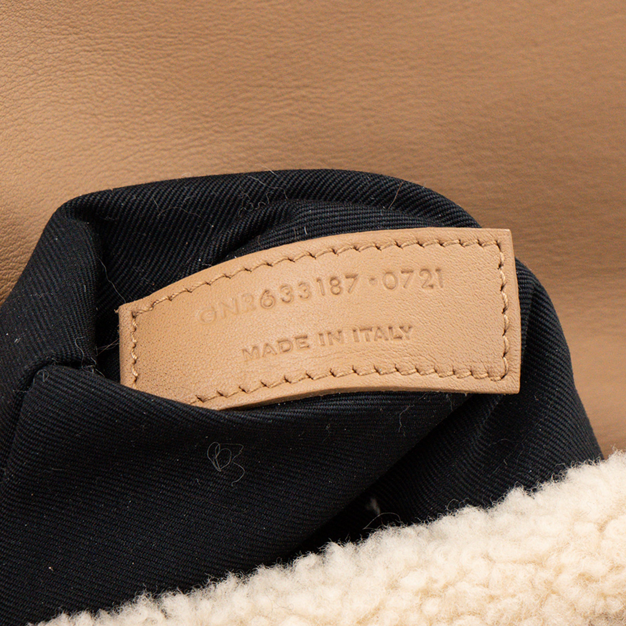 SAINT LAURENT - Sac à bandoulière Niki Saint Laurent en shearling et daim marron