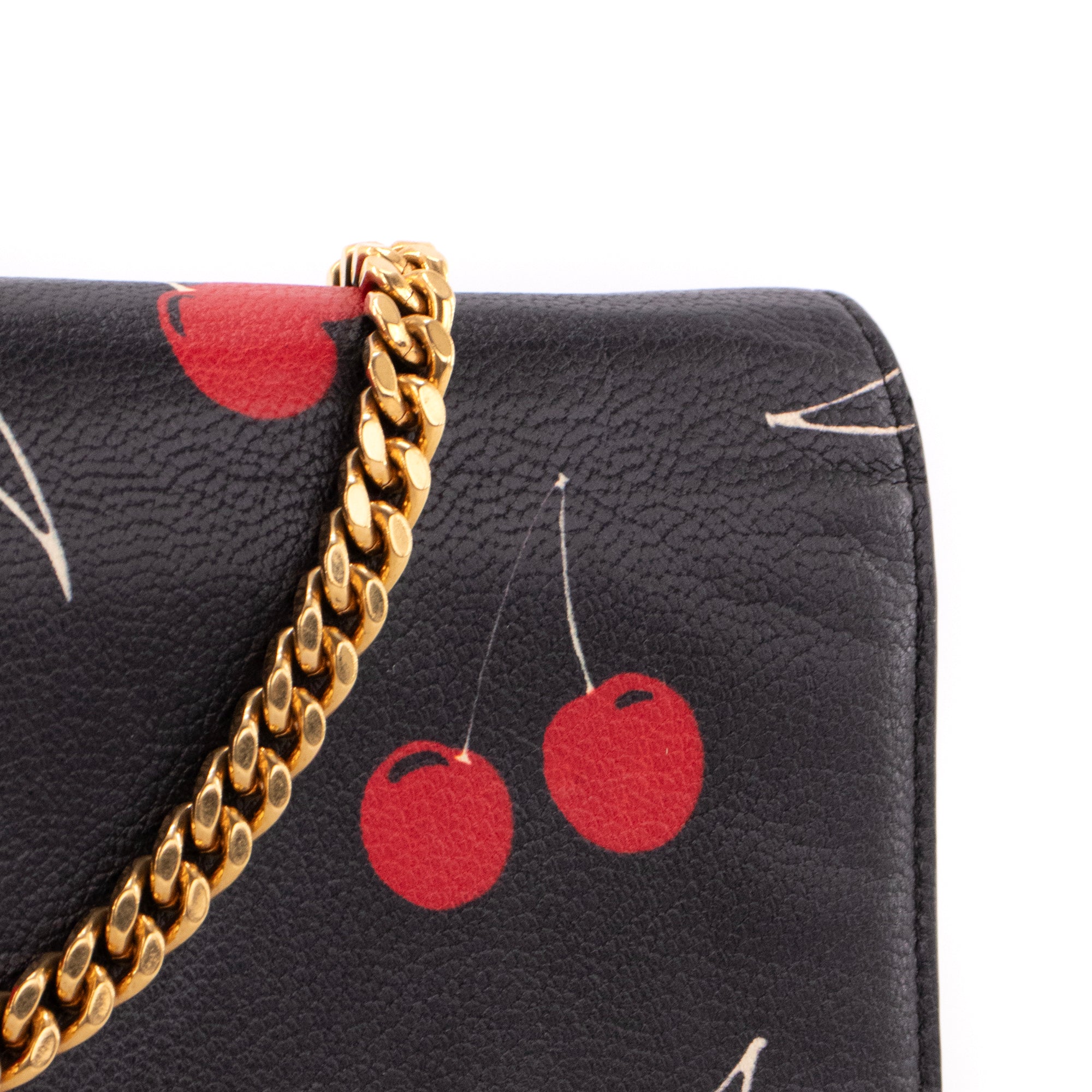 SAINT LAURENT - Sac à bandoulière Wallet On Chain Saint Laurent en cuir grainé noir imprimé cerises