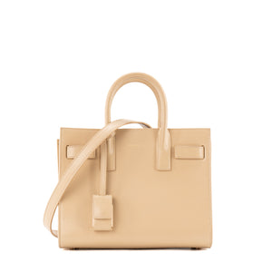 SAINT LAURENT - Sac de Jour nano Saint Laurent en cuir lisse beige