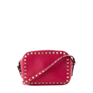 VALENTINO - Sac à bandoulière Rockstud Small Valentino en cuir lisse rose fuchsia