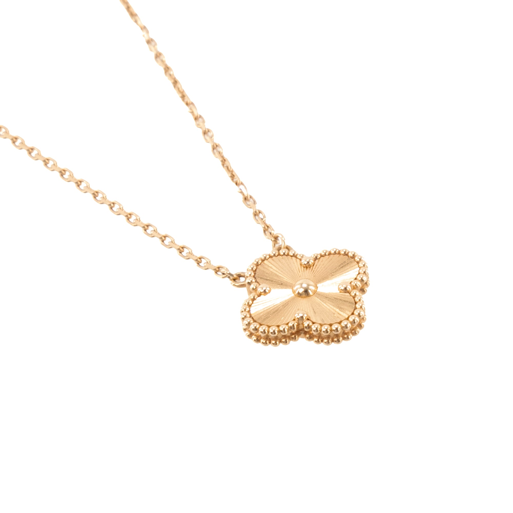 VAN CLEEF & ARPELS - Pendentif Magic Alhambra Van Cleef & Arpels en or guilloché