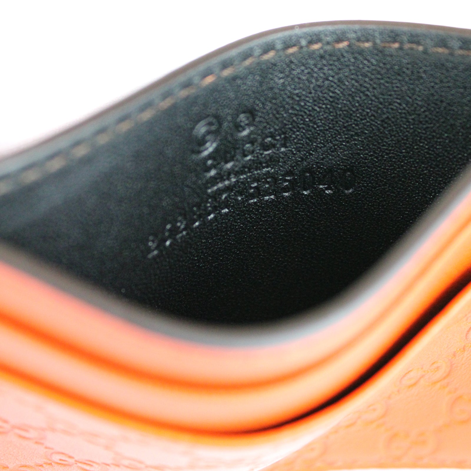 GUCCI - Porte cartes embossé GG