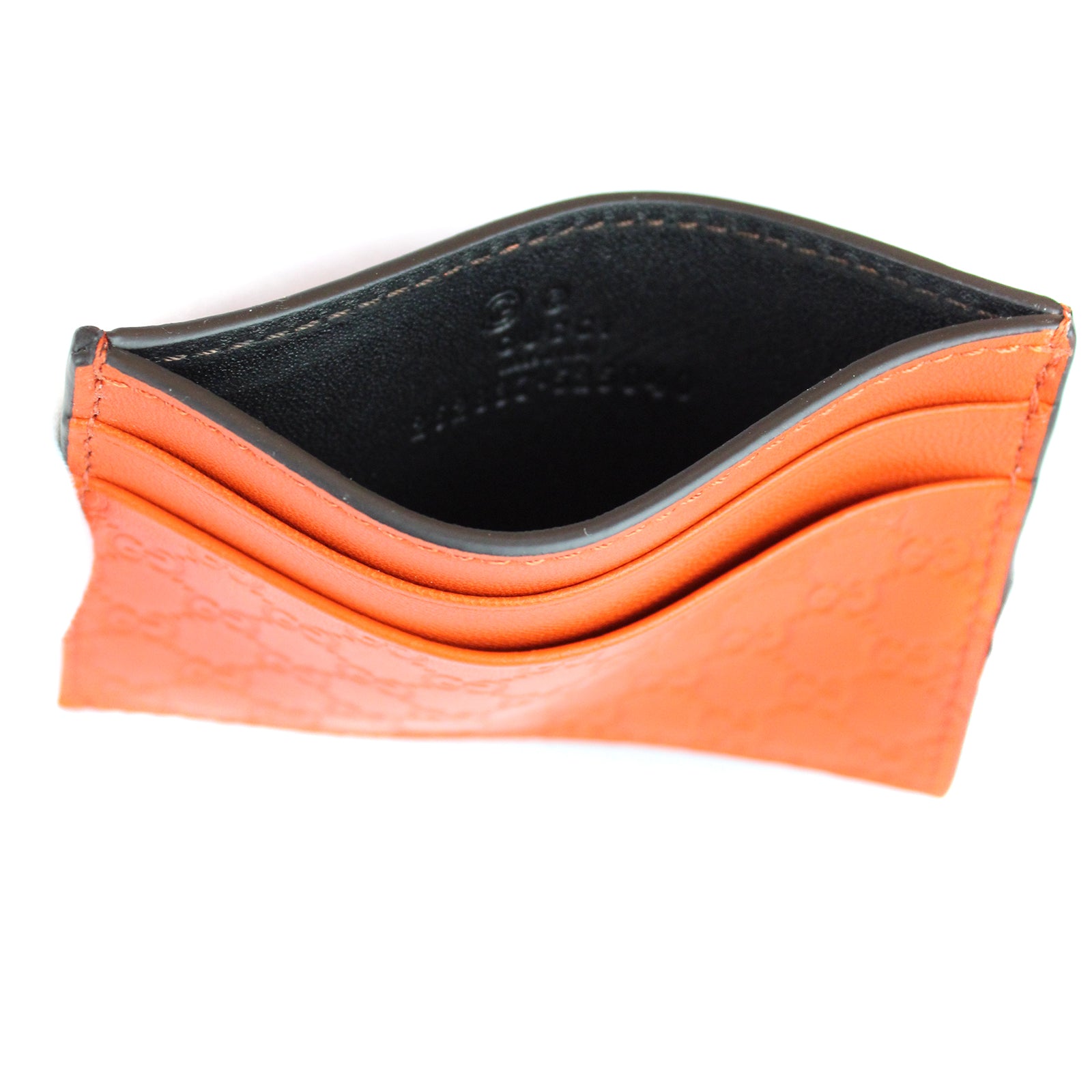 GUCCI - Porte cartes embossé GG