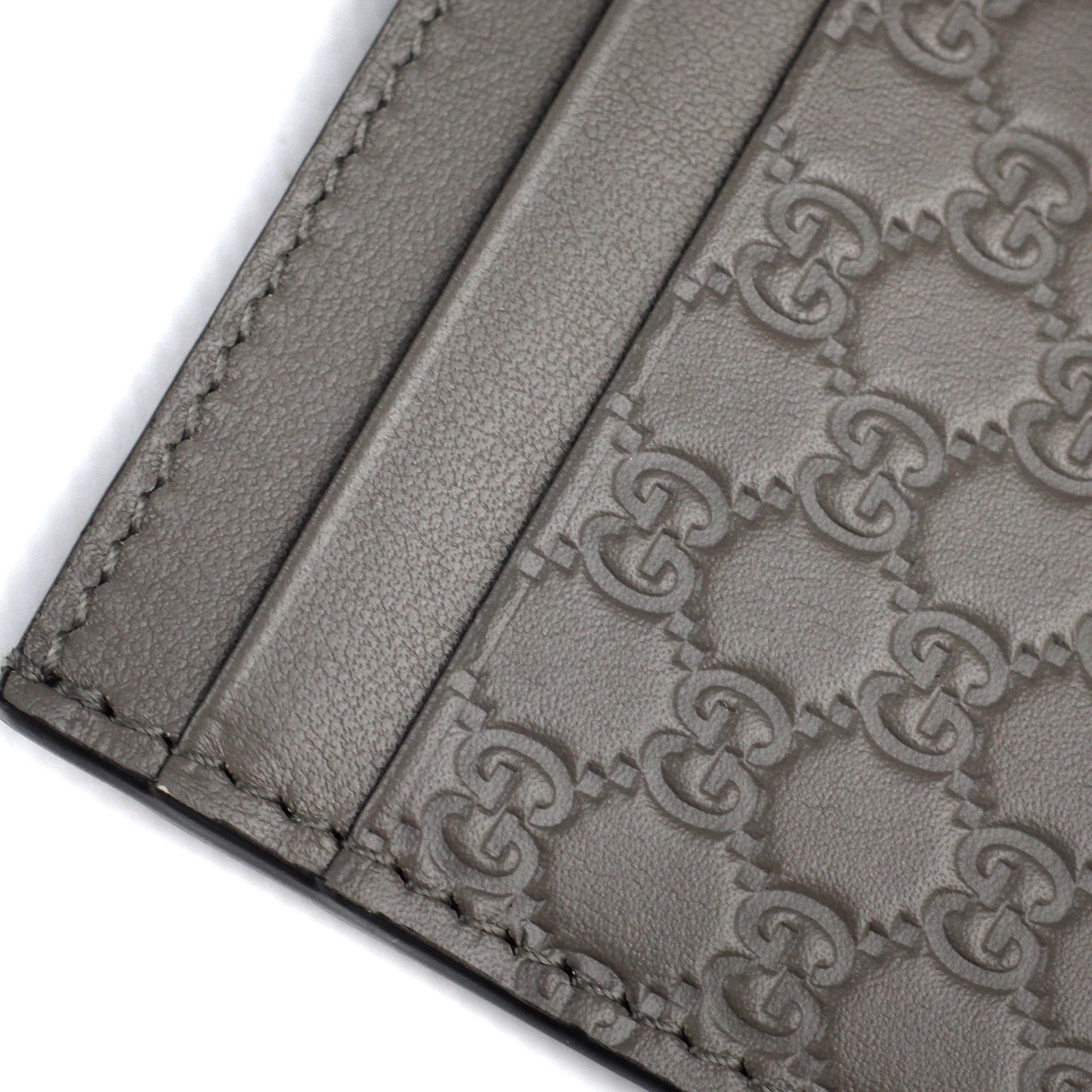 GUCCI - Porte cartes embossé GG