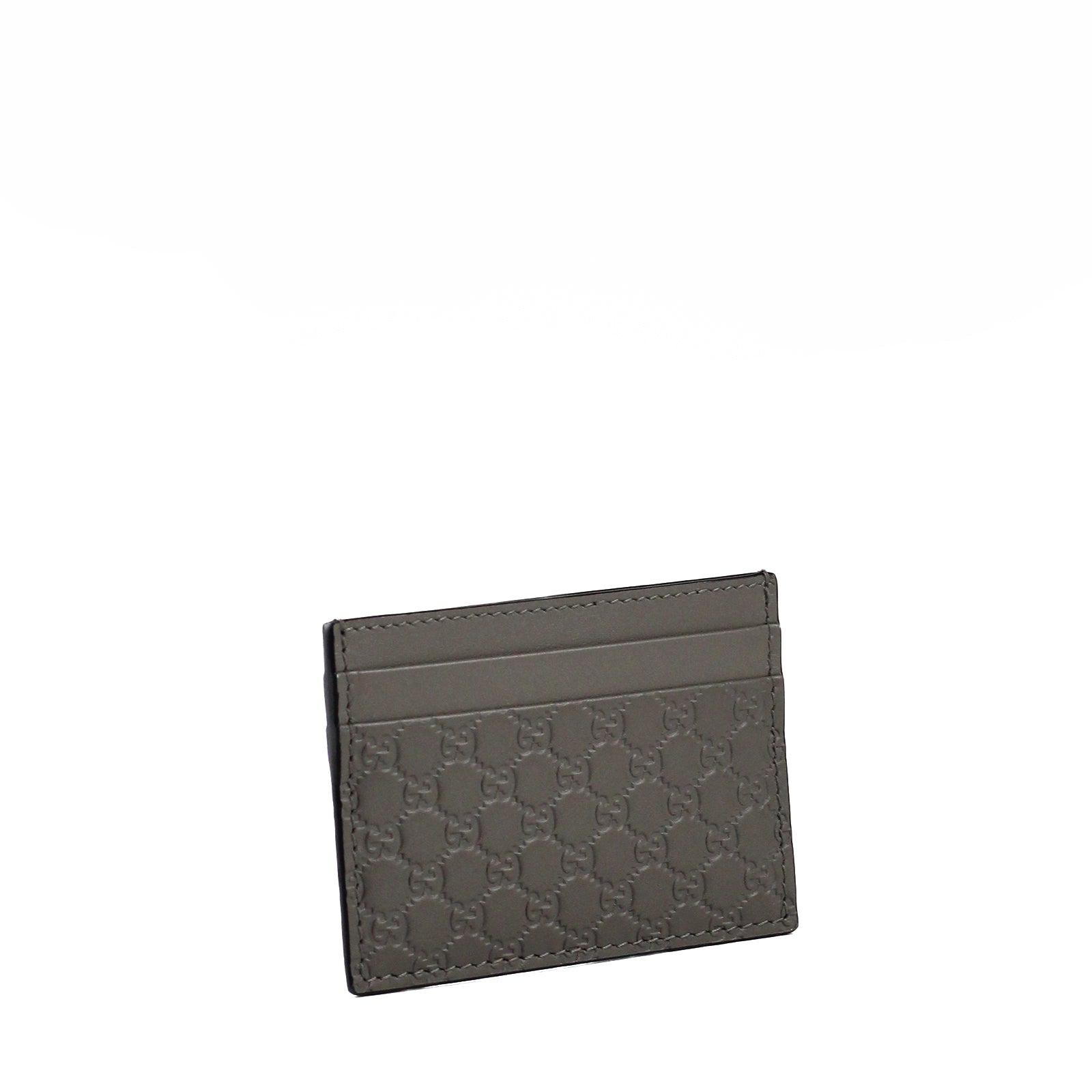 GUCCI - Porte cartes embossé GG