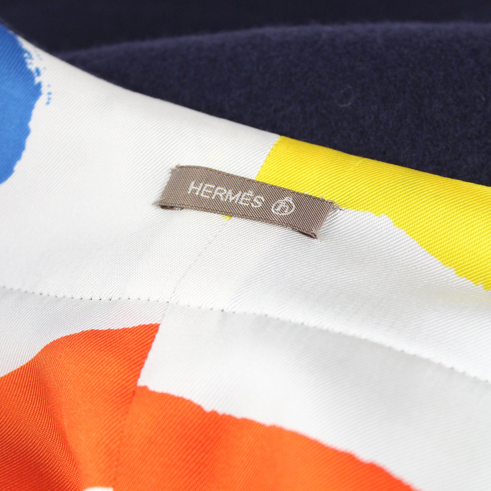 HERMÈS - Reversible cashmere and silk “petit h” cape
